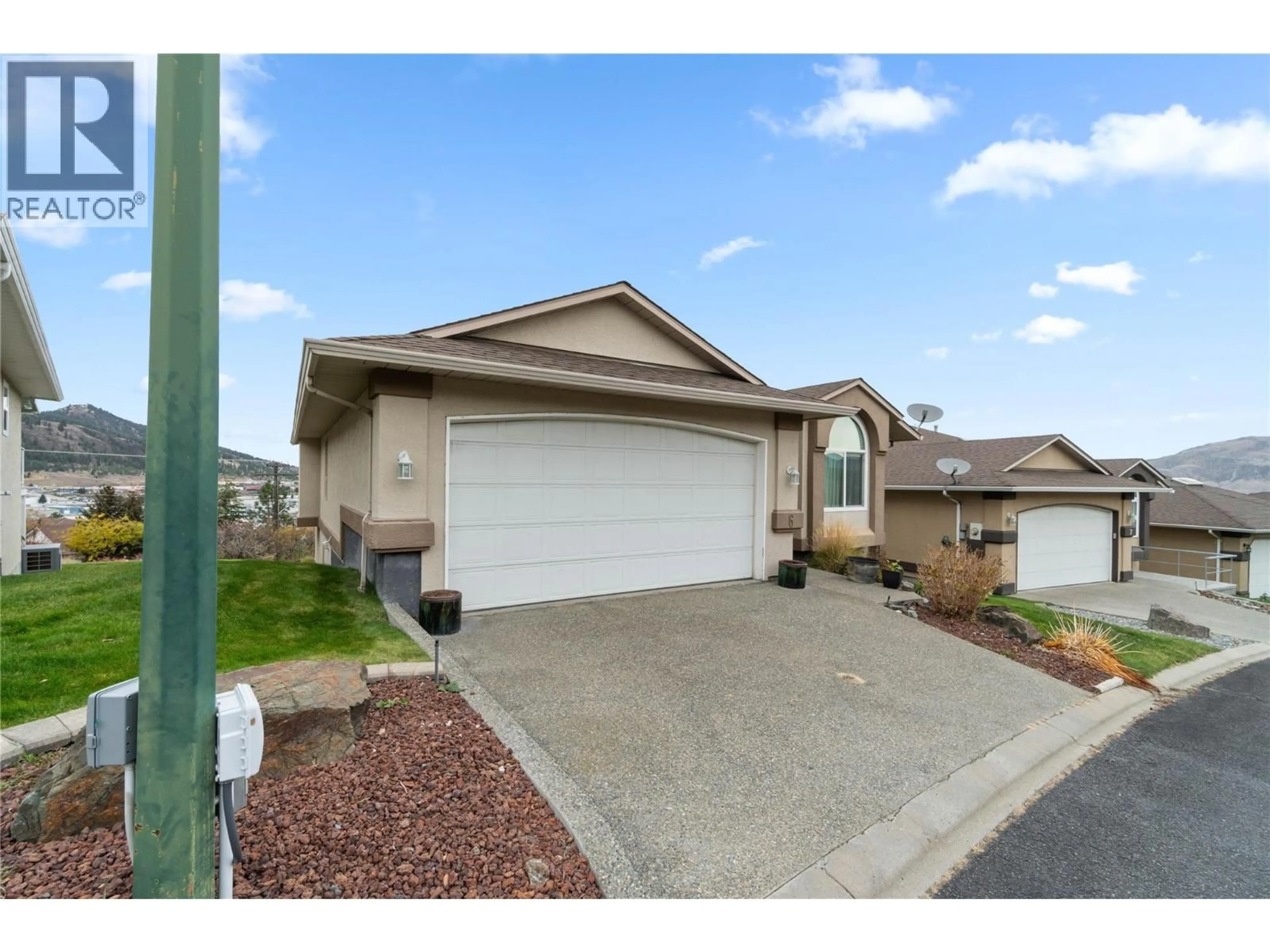 Home with vinyl exterior material, street for 6 - 1575 SPRINGHILL DRIVE, Kamloops British Columbia V2E2N9