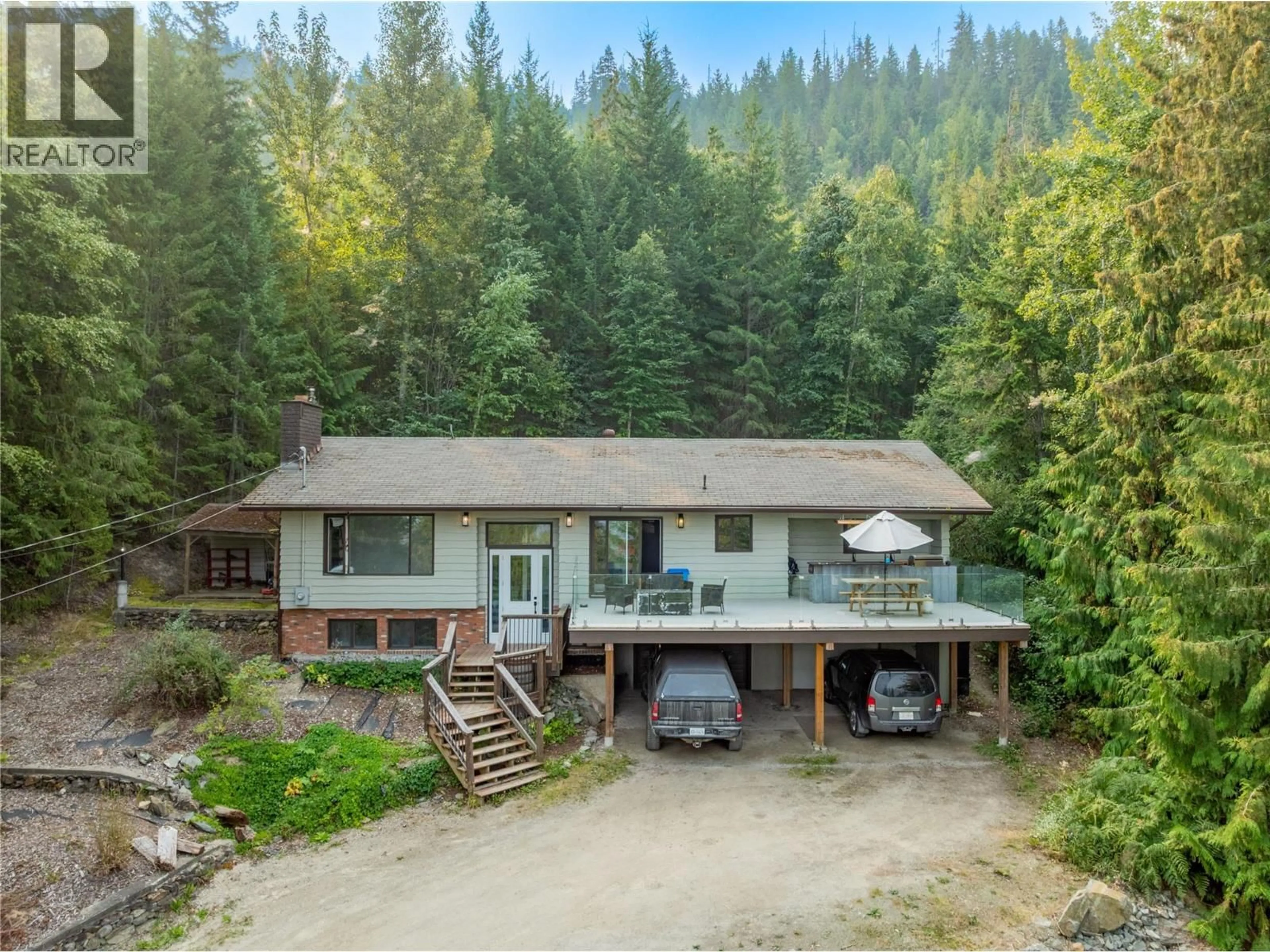 A pic from outside/outdoor area/front of a property/back of a property/a pic from drone, forest/trees view for 4018 GREAVES ROAD, Eagle Bay British Columbia V0E1T0