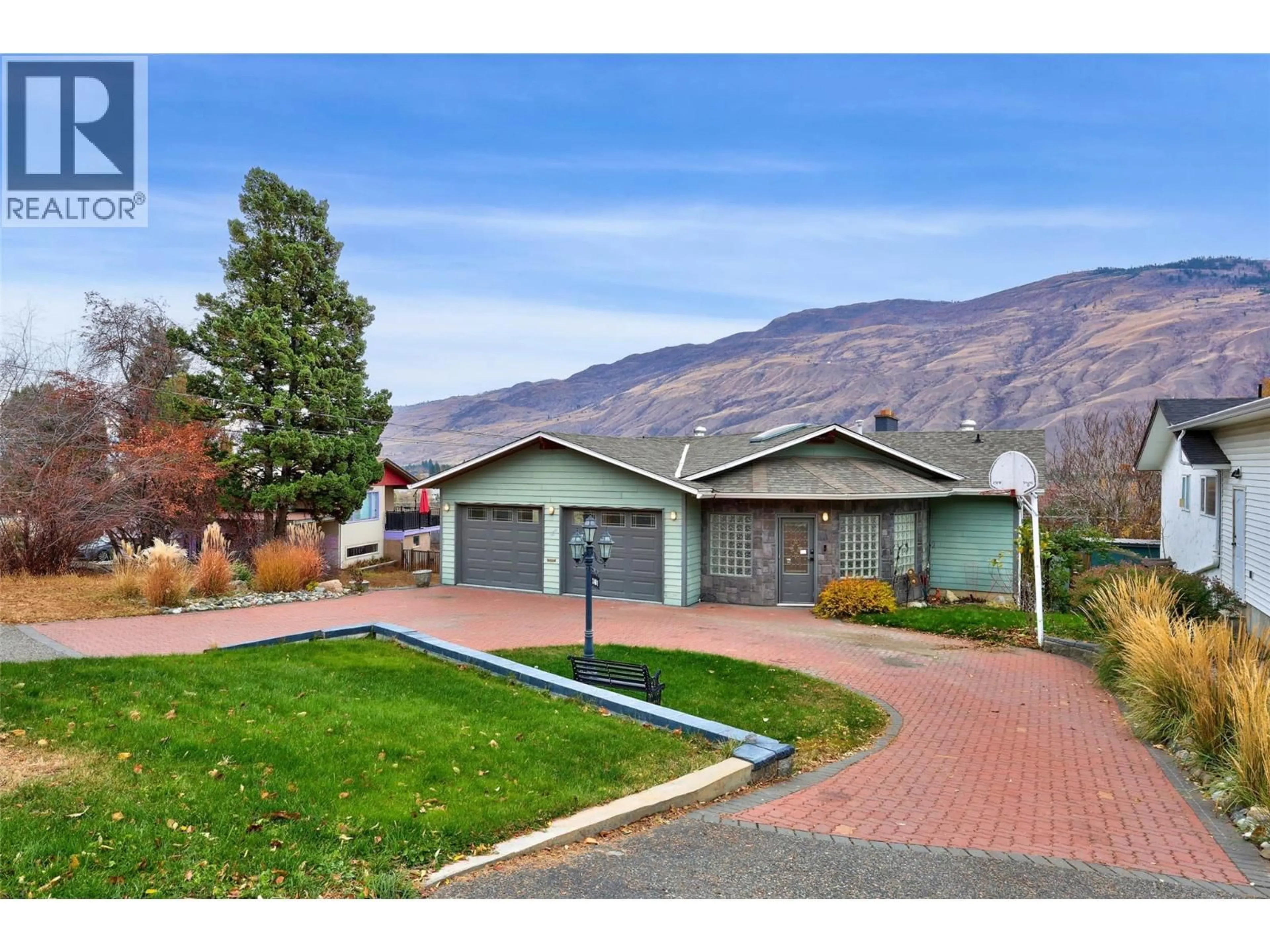 A pic from outside/outdoor area/front of a property/back of a property/a pic from drone, mountain view for 2481 PARKVIEW DRIVE, Kamloops British Columbia V2B7J3