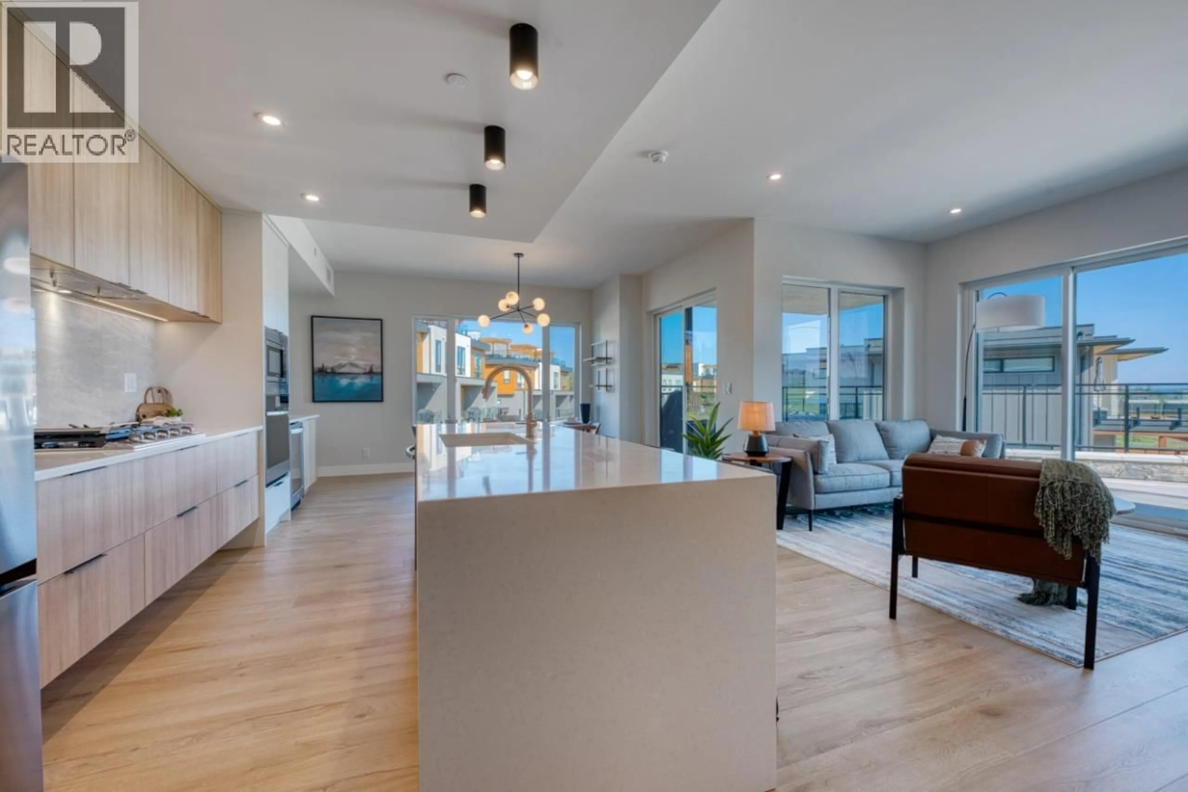 Open concept kitchen, unknown for 103 - 75 PREDATOR RIDGE DRIVE, Vernon British Columbia V1H1G4