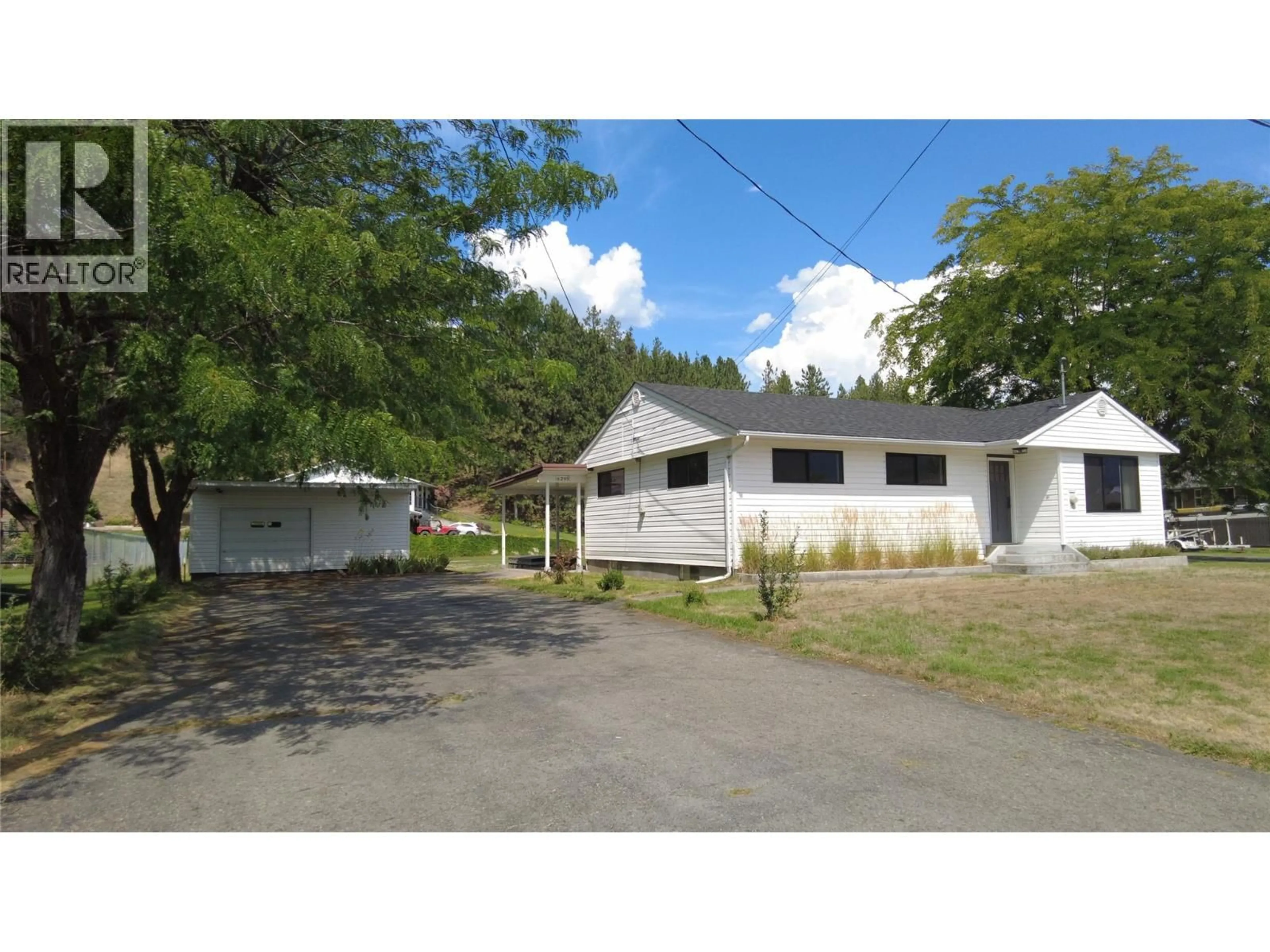A pic from outside/outdoor area/front of a property/back of a property/a pic from drone, street for 6295 COLLEGE ROAD, Grand Forks British Columbia V0H1H2