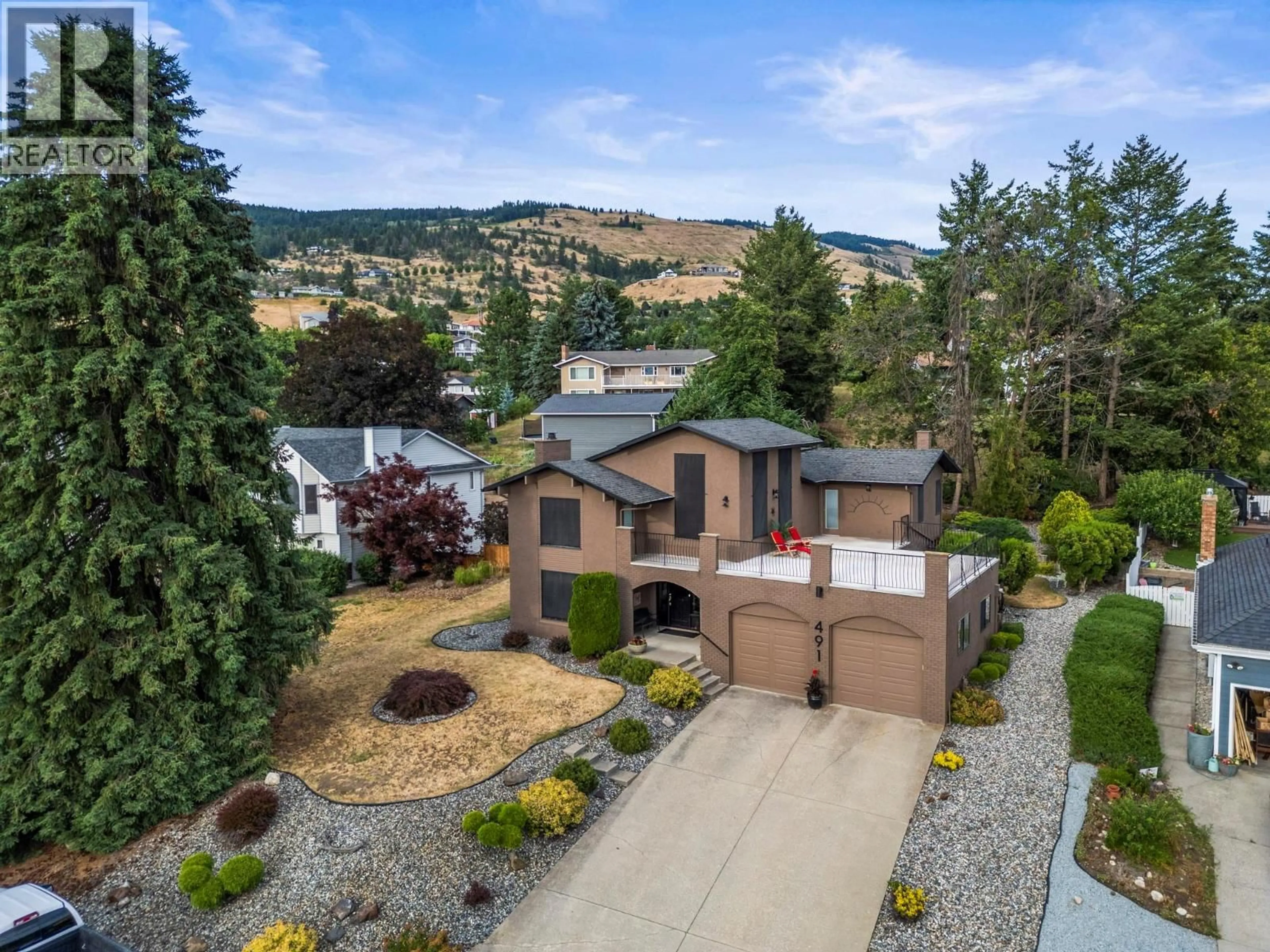 A pic from outside/outdoor area/front of a property/back of a property/a pic from drone, unknown for 491 TERRACE DRIVE, Coldstream British Columbia V1B2W9