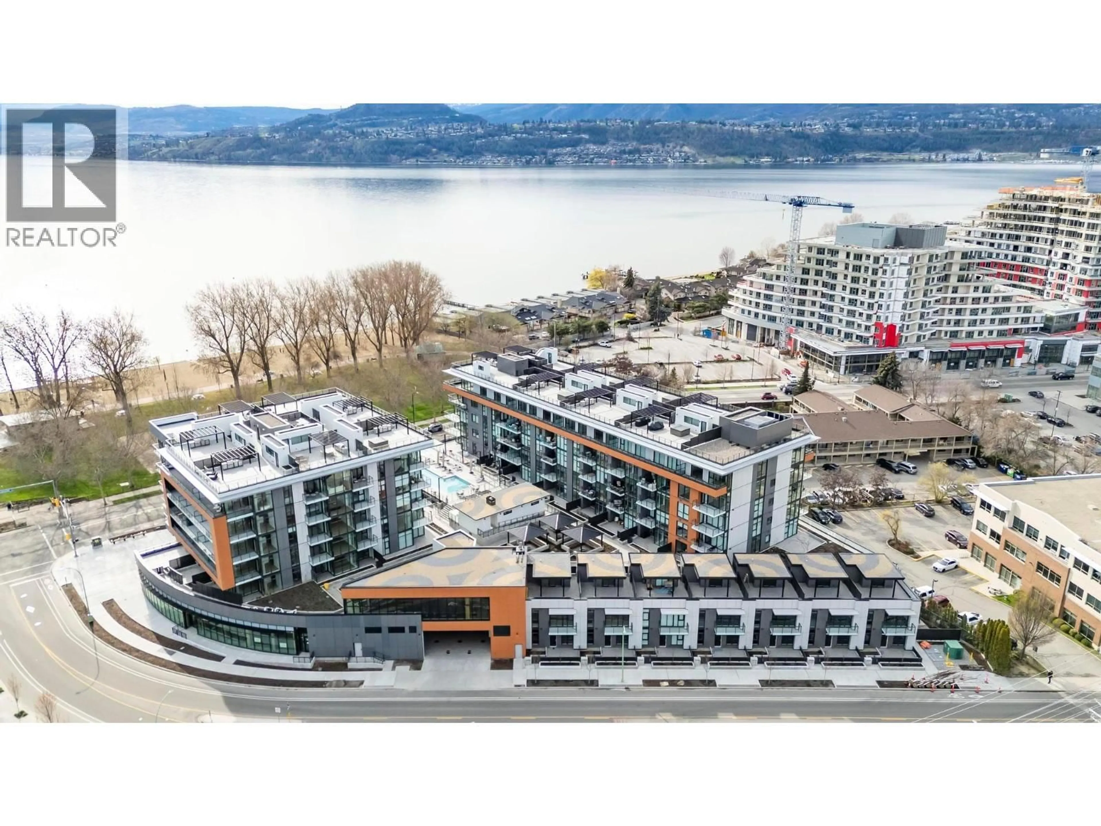 A pic from outside/outdoor area/front of a property/back of a property/a pic from drone, water/lake/river/ocean view for 3352 RICHTER STREET, Kelowna British Columbia V1W3S9
