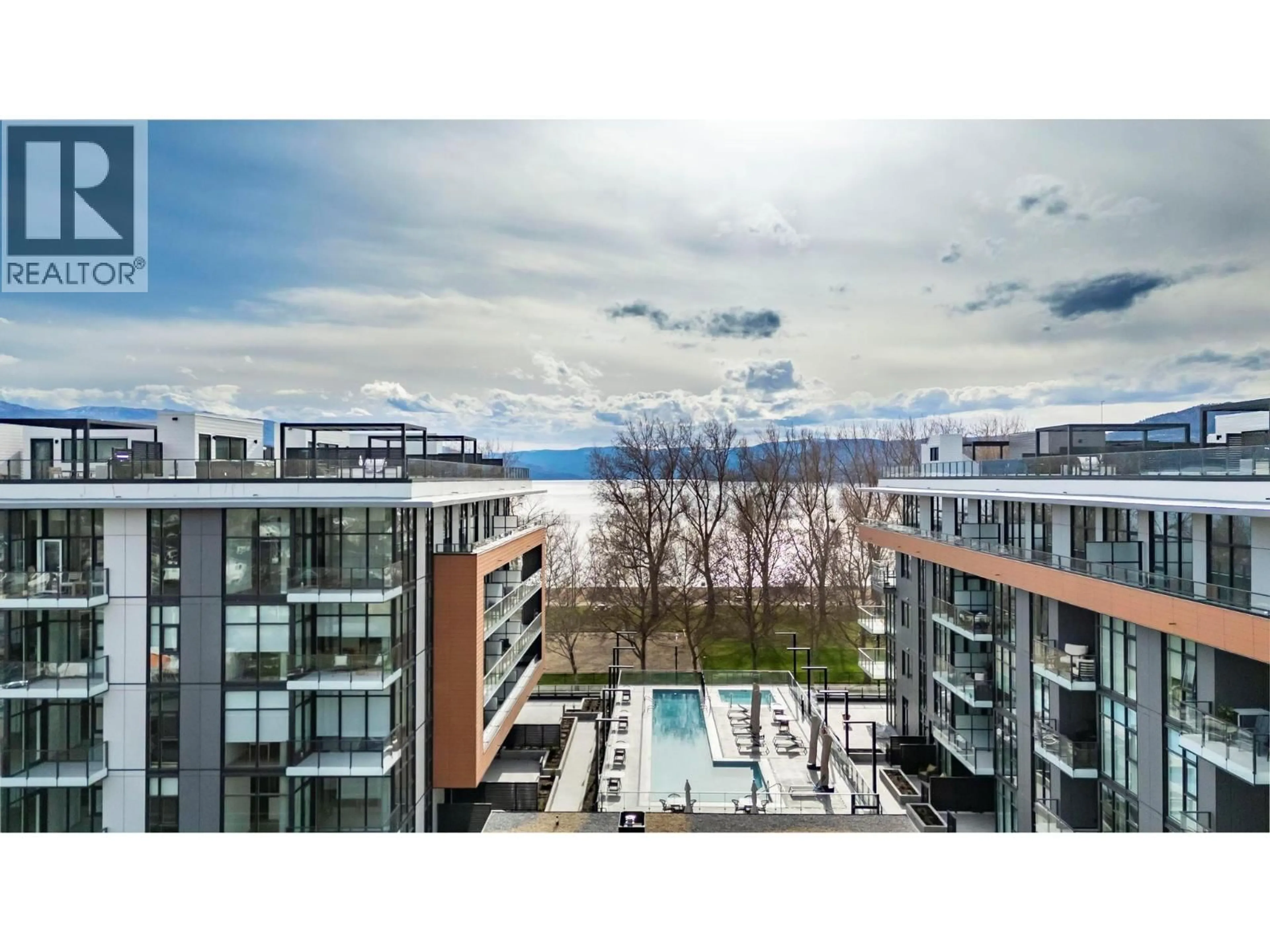 A pic from outside/outdoor area/front of a property/back of a property/a pic from drone, city buildings view from balcony for 3352 RICHTER STREET, Kelowna British Columbia V1W3S9