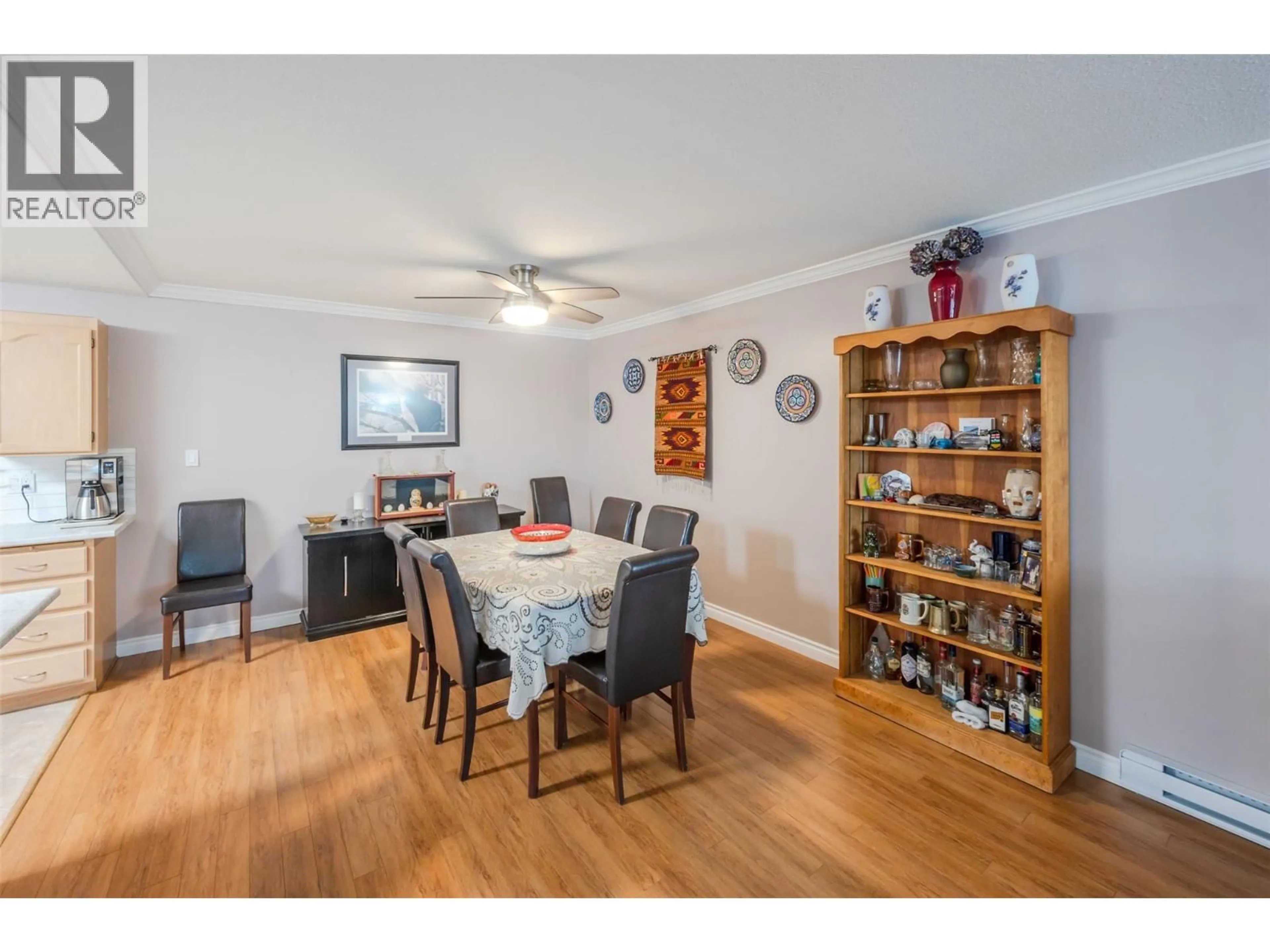Dining room, wood/laminate floor for 203 - 2477 INGRAM ROAD, West Kelowna British Columbia V4T1W7