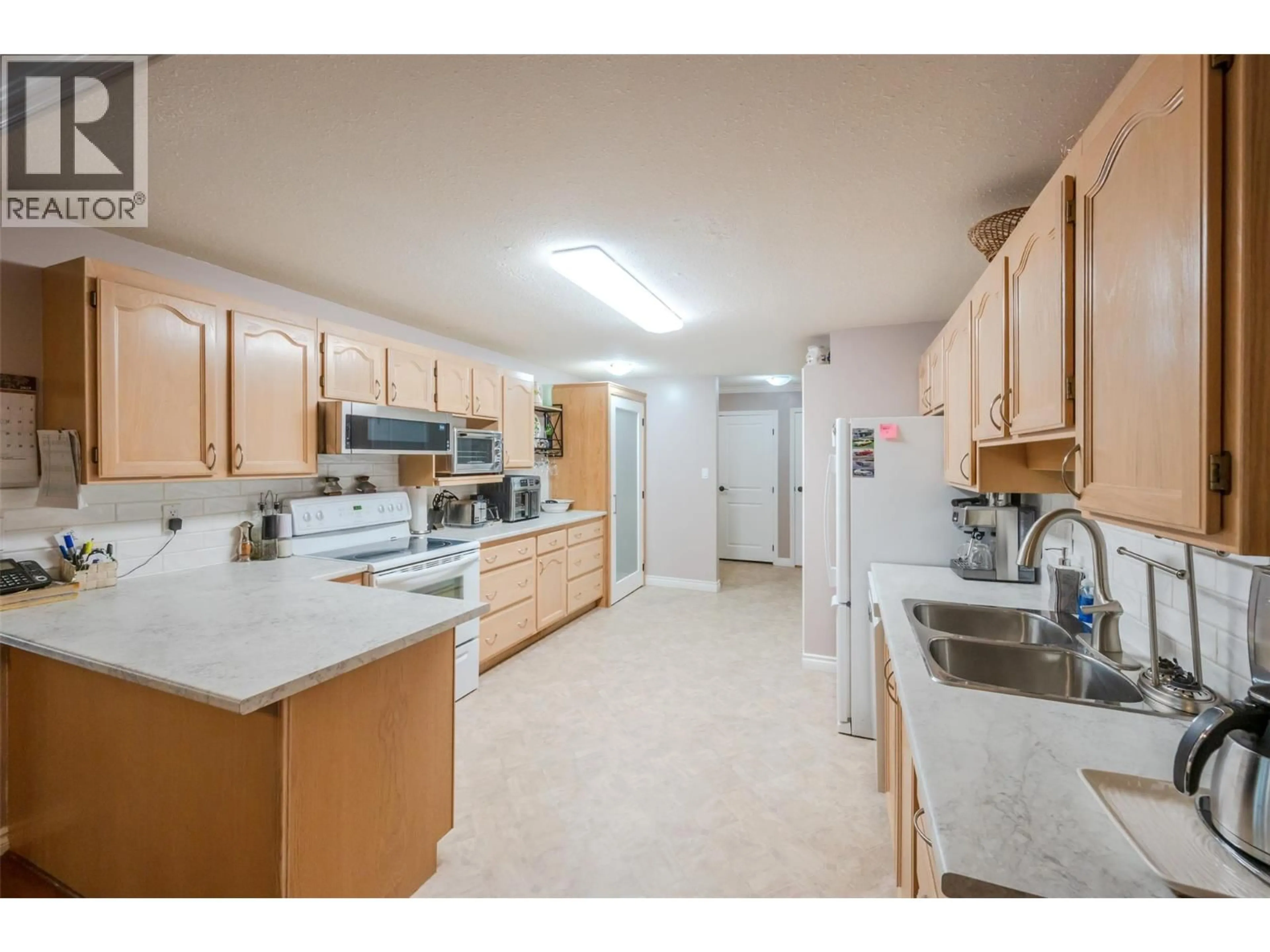 Standard kitchen, unknown for 203 - 2477 INGRAM ROAD, West Kelowna British Columbia V4T1W7