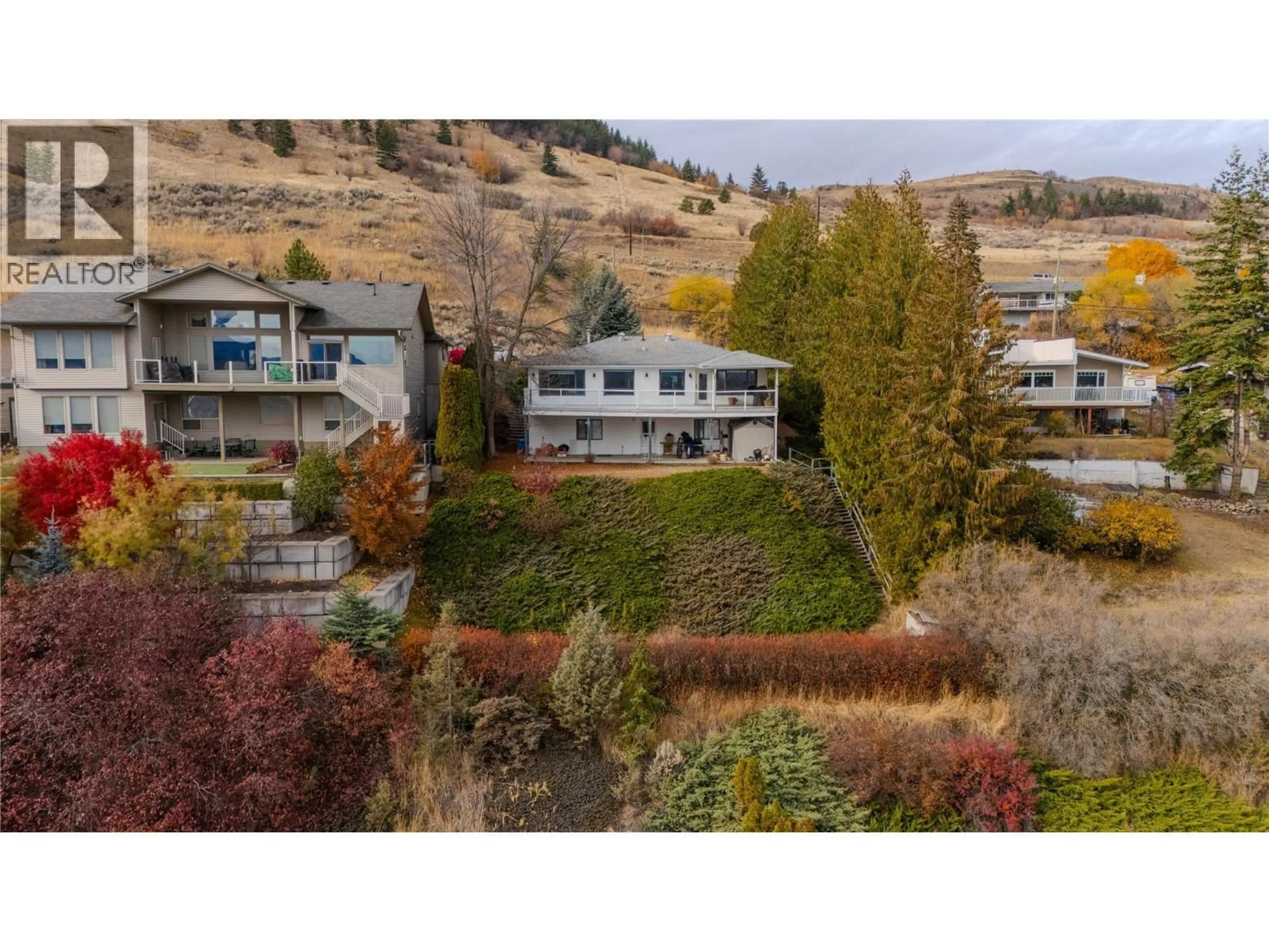 A pic from outside/outdoor area/front of a property/back of a property/a pic from drone, mountain view for 7903 LAKEVIEW DRIVE, Coldstream British Columbia V1B1W4
