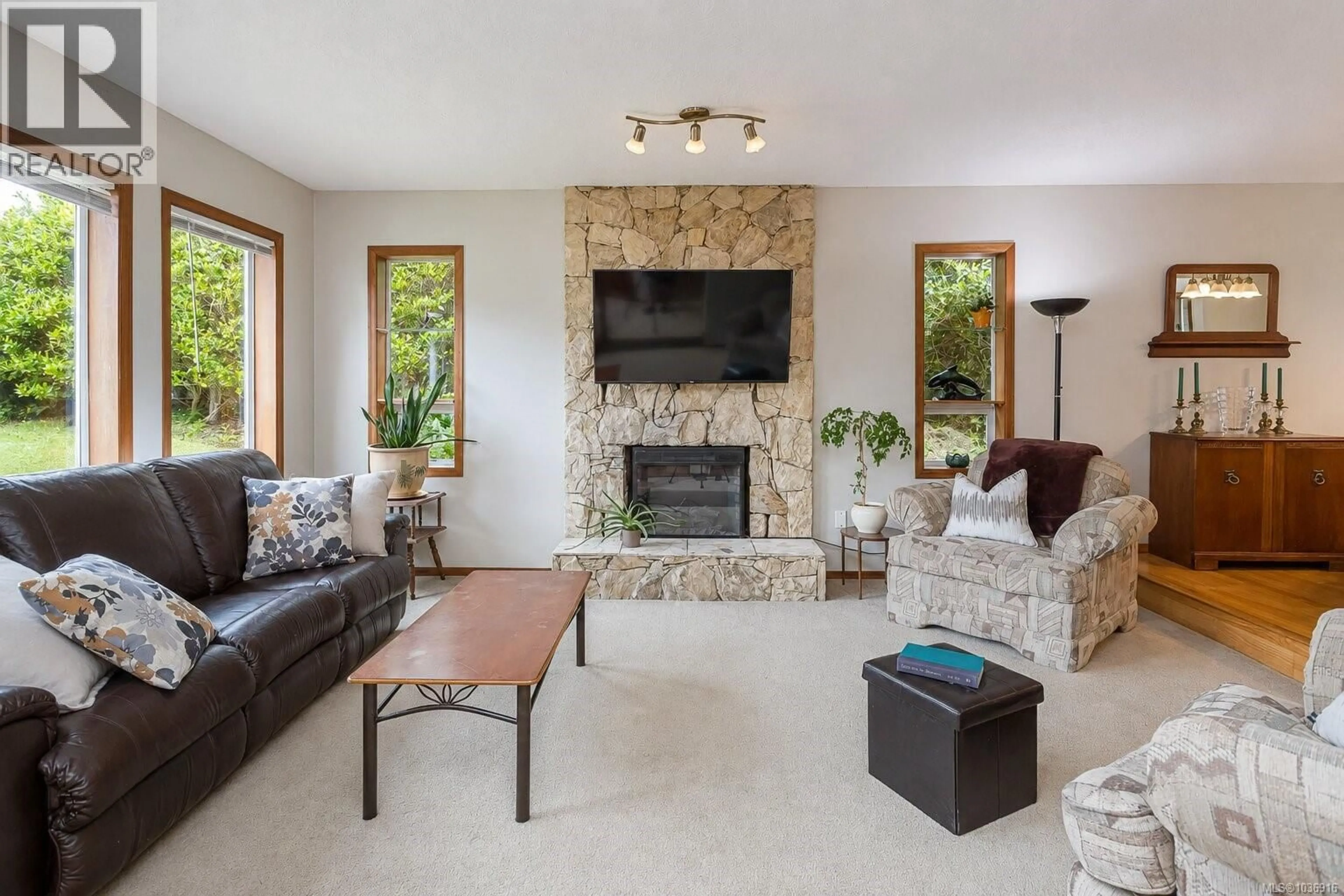 Living room with furniture, ceramic/tile floor for 3388 ST. TROY PLACE, Colwood British Columbia V9C3J9