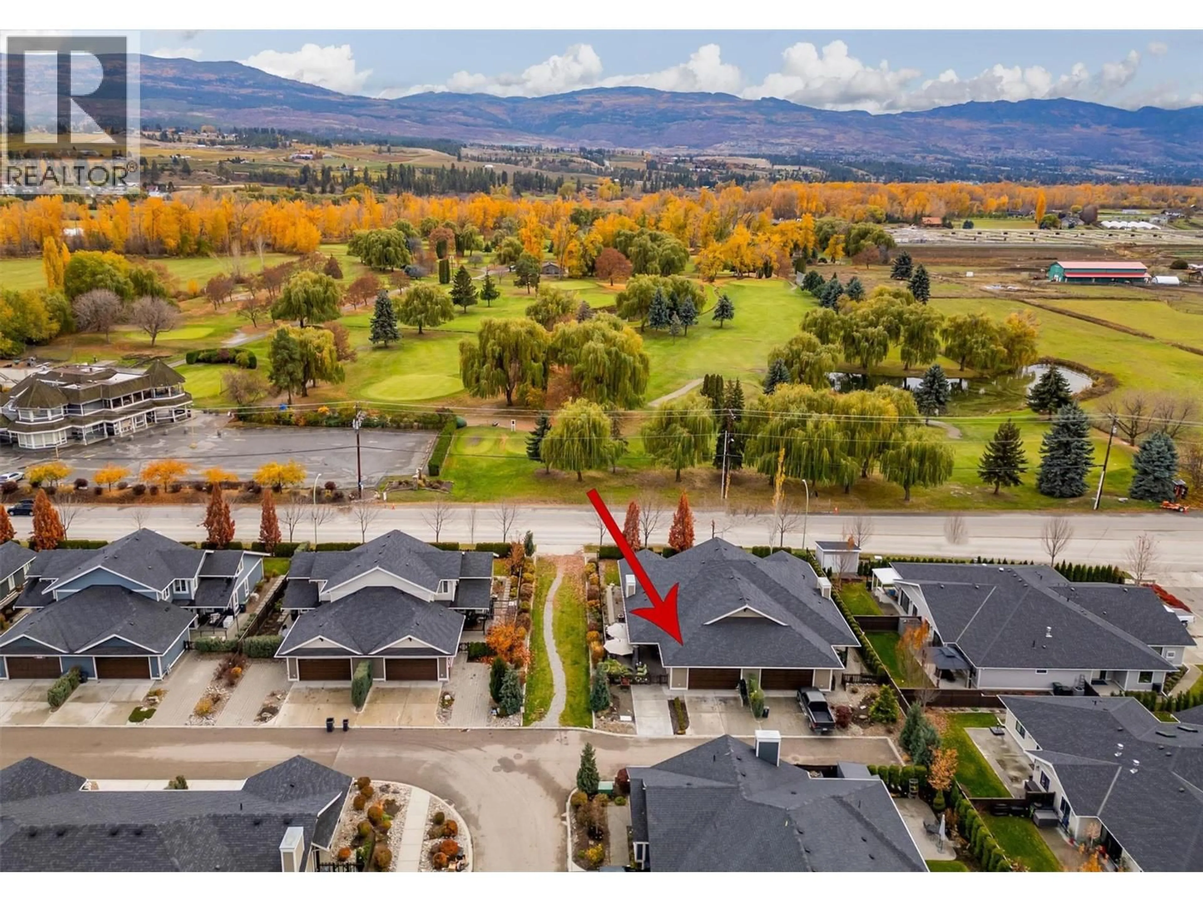 A pic from outside/outdoor area/front of a property/back of a property/a pic from drone, mountain view for 11 - 1960 KLO ROAD, Kelowna British Columbia V1W5L2