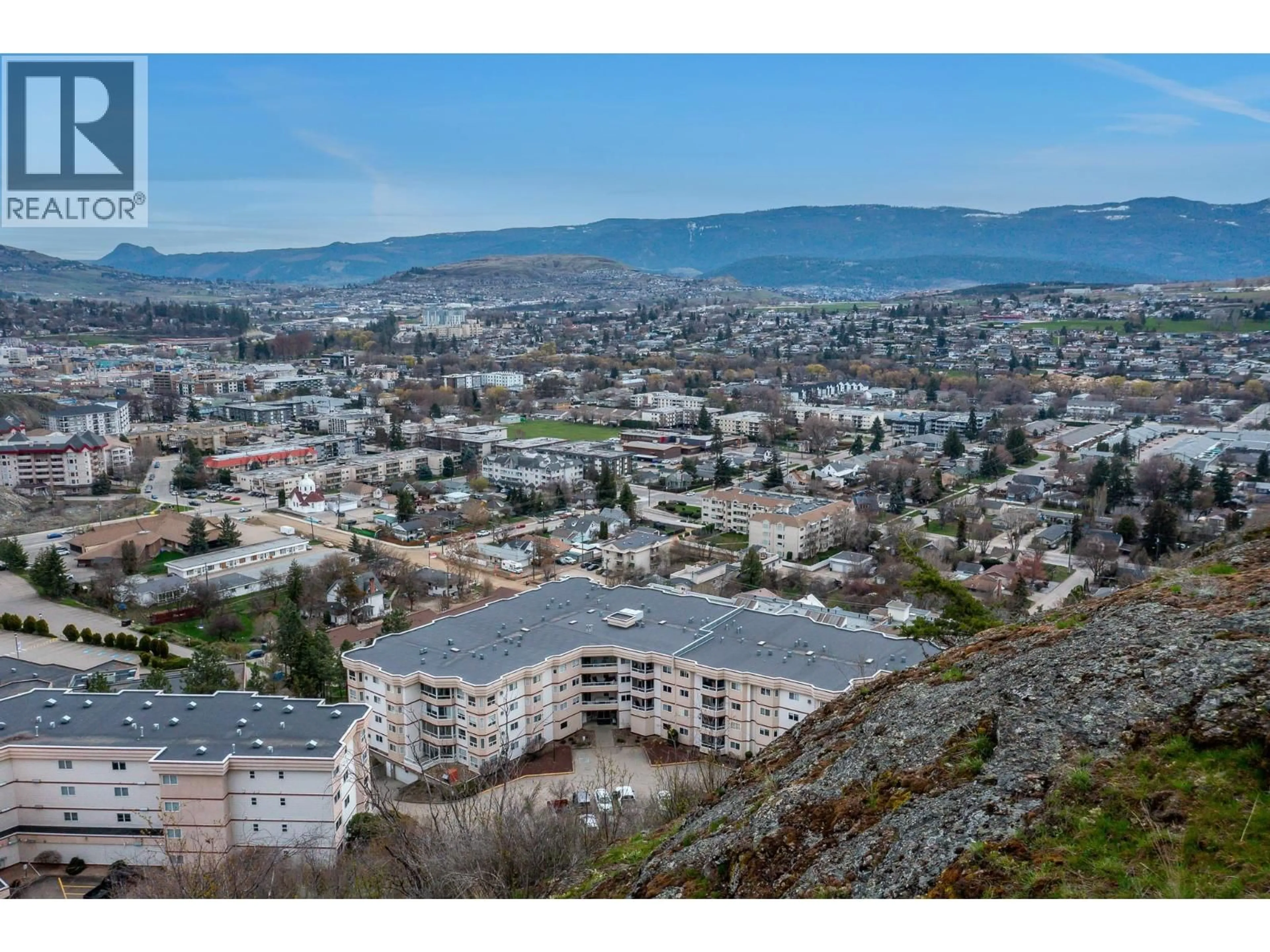 A pic from outside/outdoor area/front of a property/back of a property/a pic from drone, mountain view for 401 - 3806 35 AVENUE, Vernon British Columbia V1T9N6