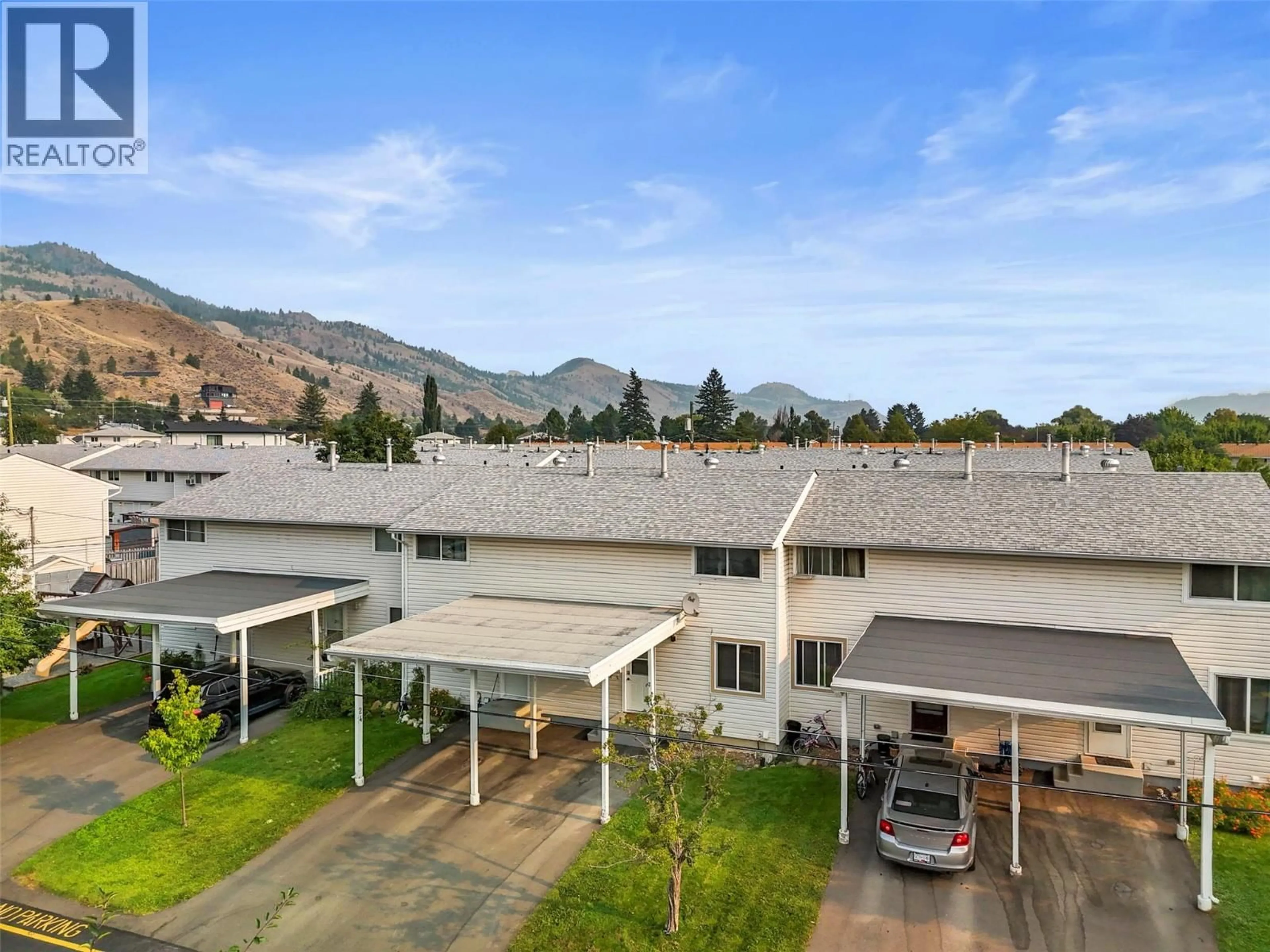 A pic from outside/outdoor area/front of a property/back of a property/a pic from drone, mountain view for 25 - 2564 SANDPIPER DRIVE, Kamloops British Columbia V2B6X1