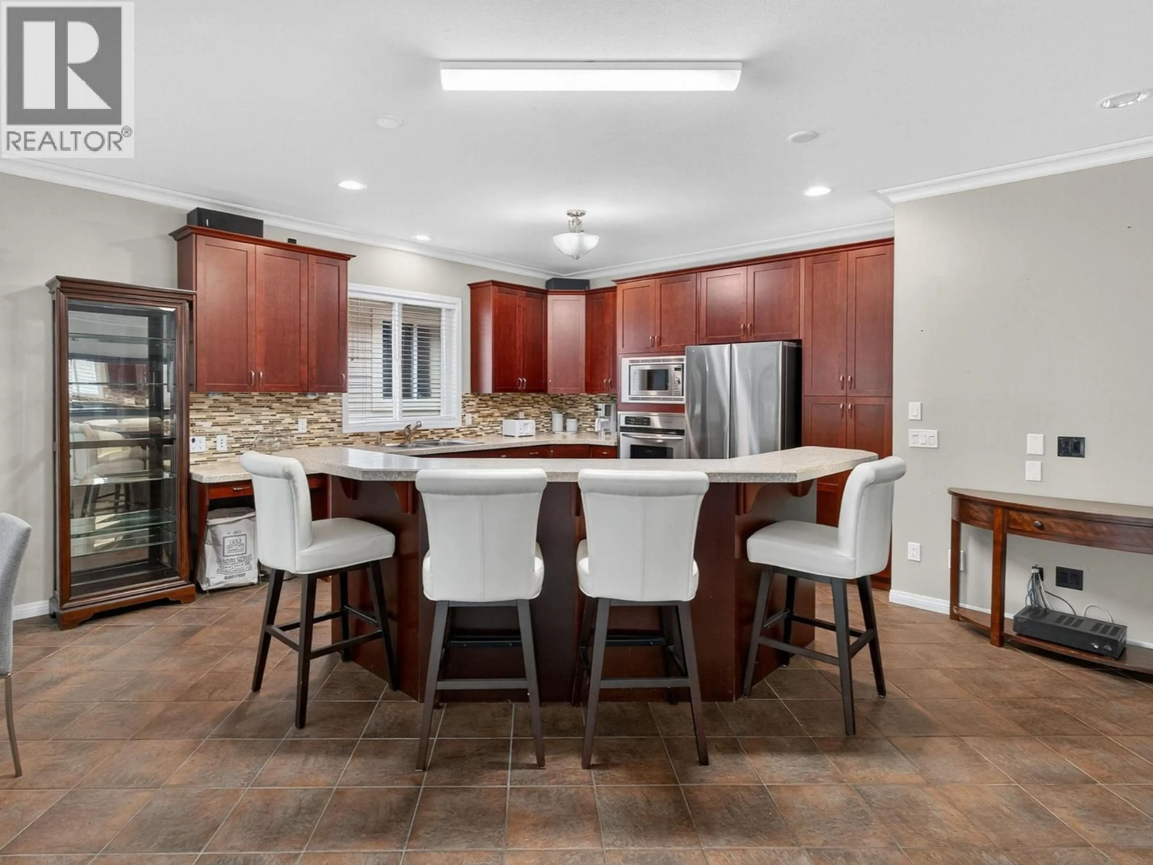 Open concept kitchen, ceramic/tile floor for 208 - 665 COOK ROAD, Kelowna British Columbia V1W4T4