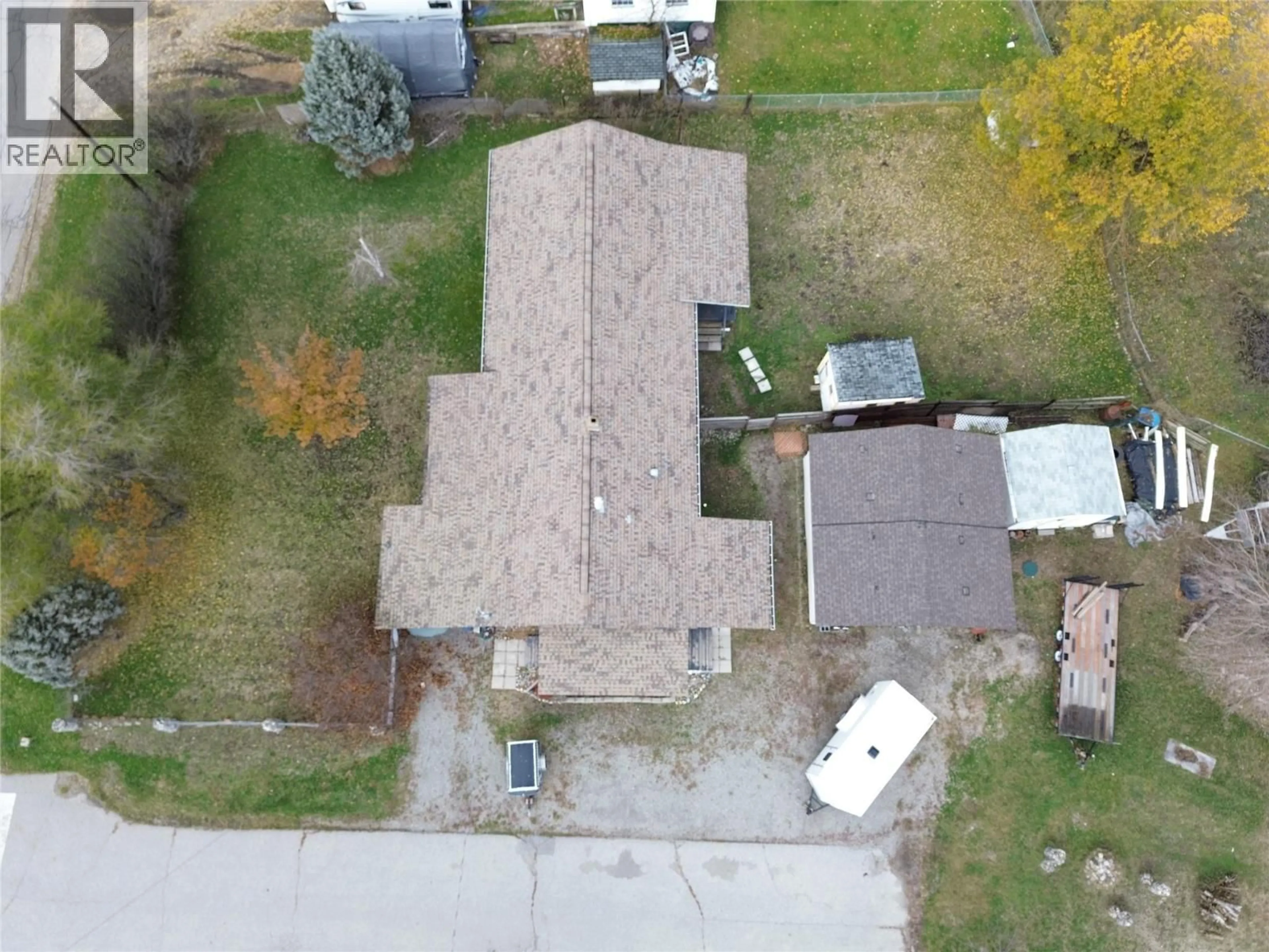 A pic from outside/outdoor area/front of a property/back of a property/a pic from drone, street for 6408 5TH STREET, Grand Forks British Columbia V0H1H4