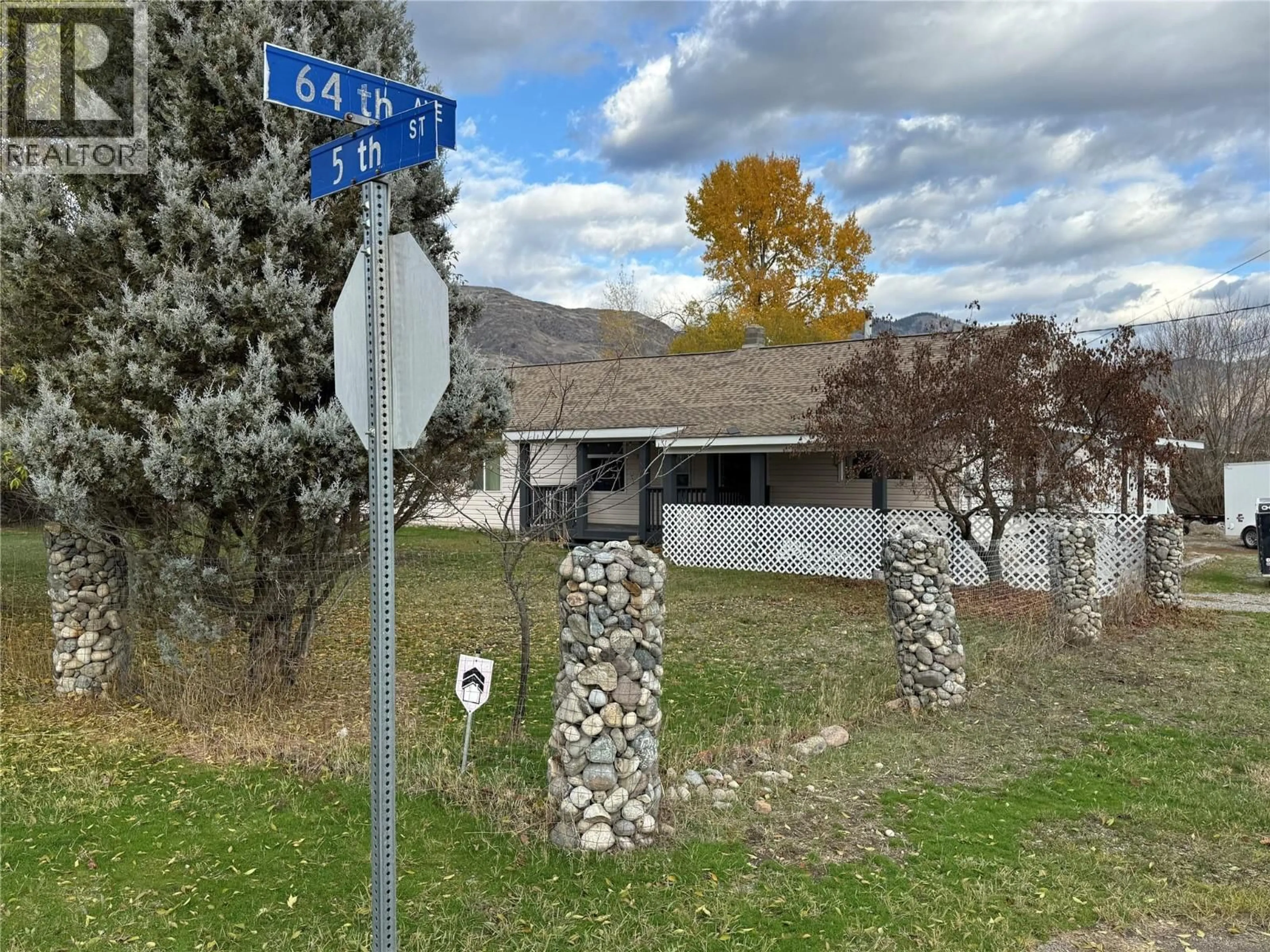 A pic from outside/outdoor area/front of a property/back of a property/a pic from drone, street for 6408 5TH STREET, Grand Forks British Columbia V0H1H4