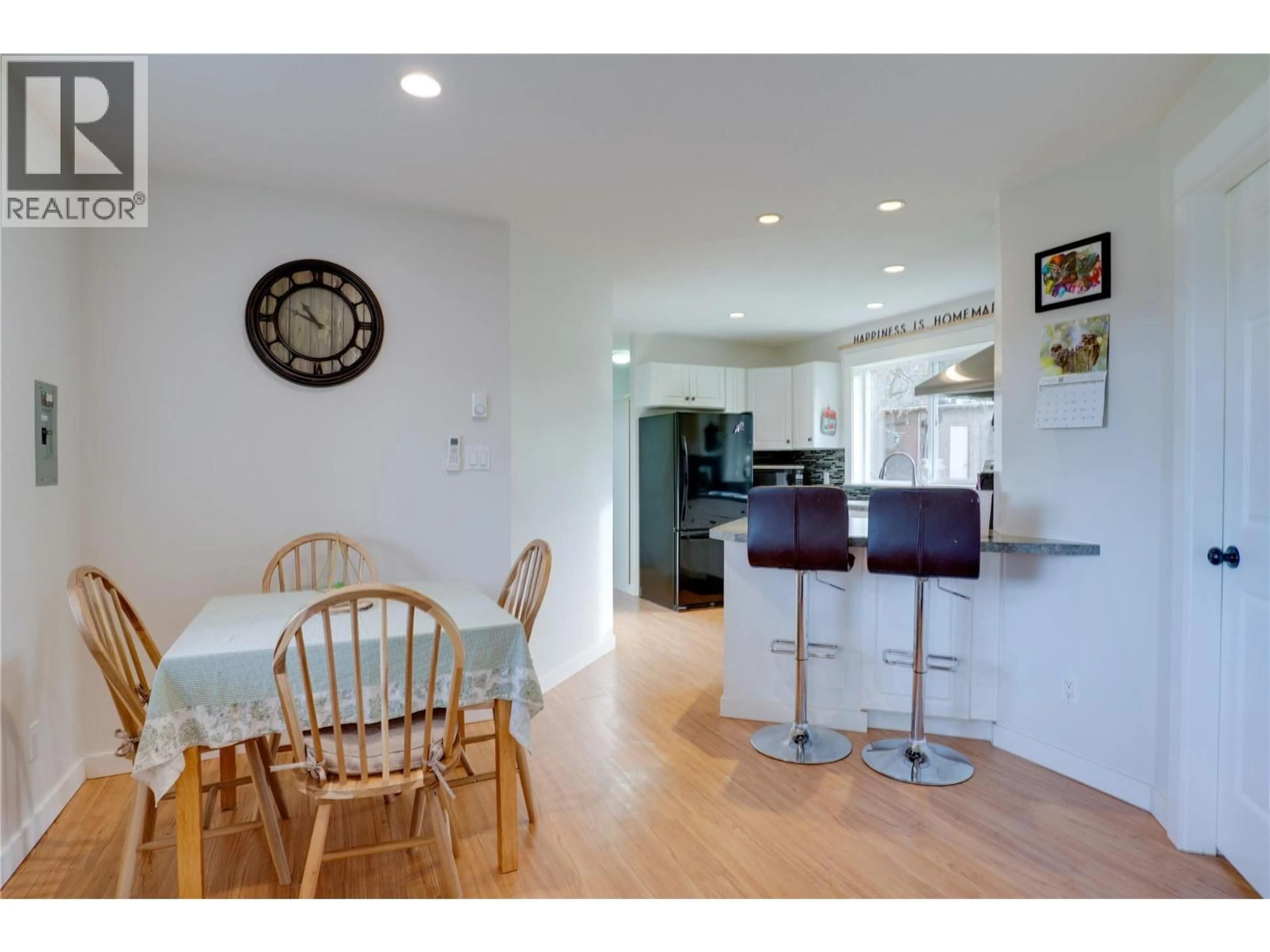 Open concept kitchen, wood/laminate floor for 3851 97A HIGHWAY, Spallumcheen British Columbia V4Y0V8