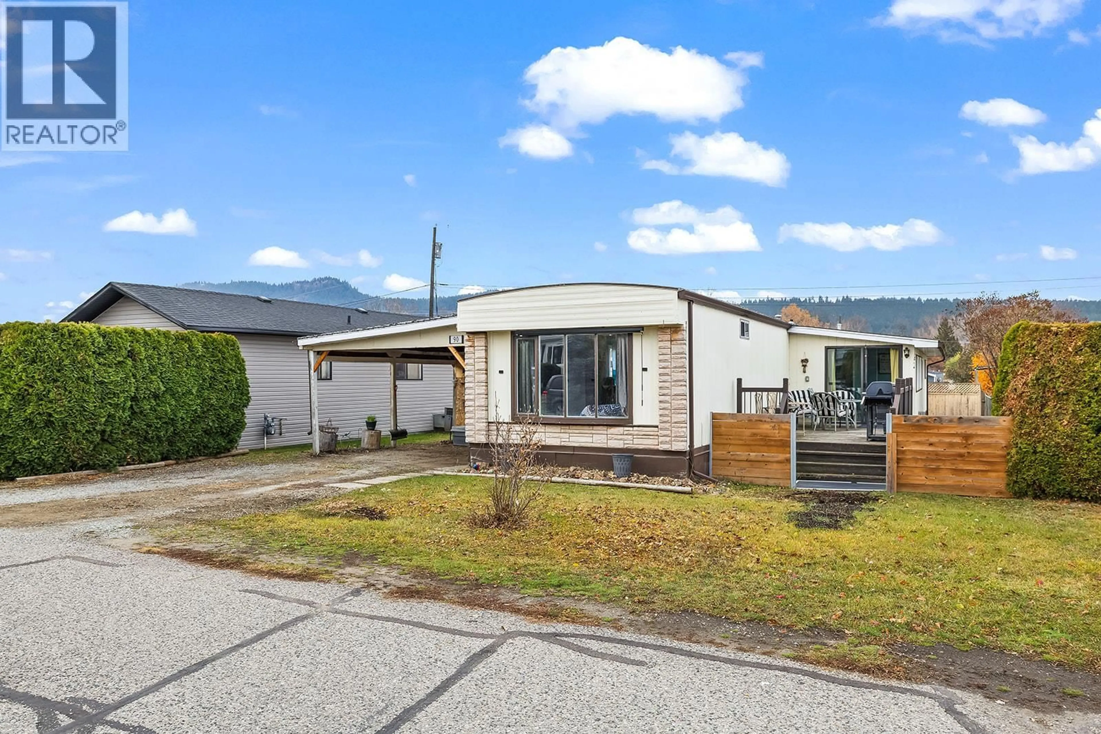 A pic from outside/outdoor area/front of a property/back of a property/a pic from drone, mountain view for 90 - 720 COMMONWEALTH ROAD, Kelowna British Columbia V4V1G7