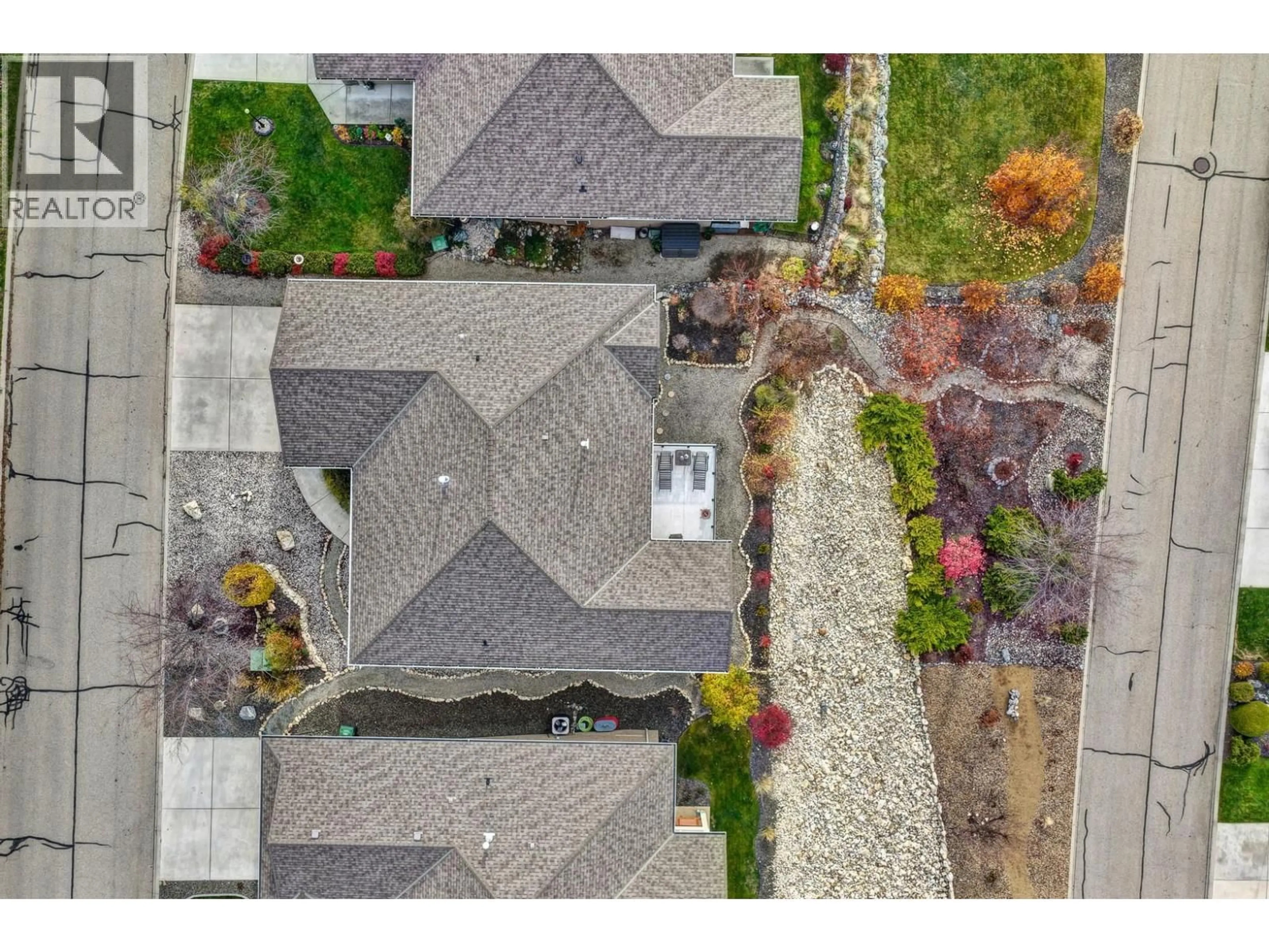 A pic from outside/outdoor area/front of a property/back of a property/a pic from drone, street for 3492 CAMELBACK DRIVE, Kelowna British Columbia V1X8A7