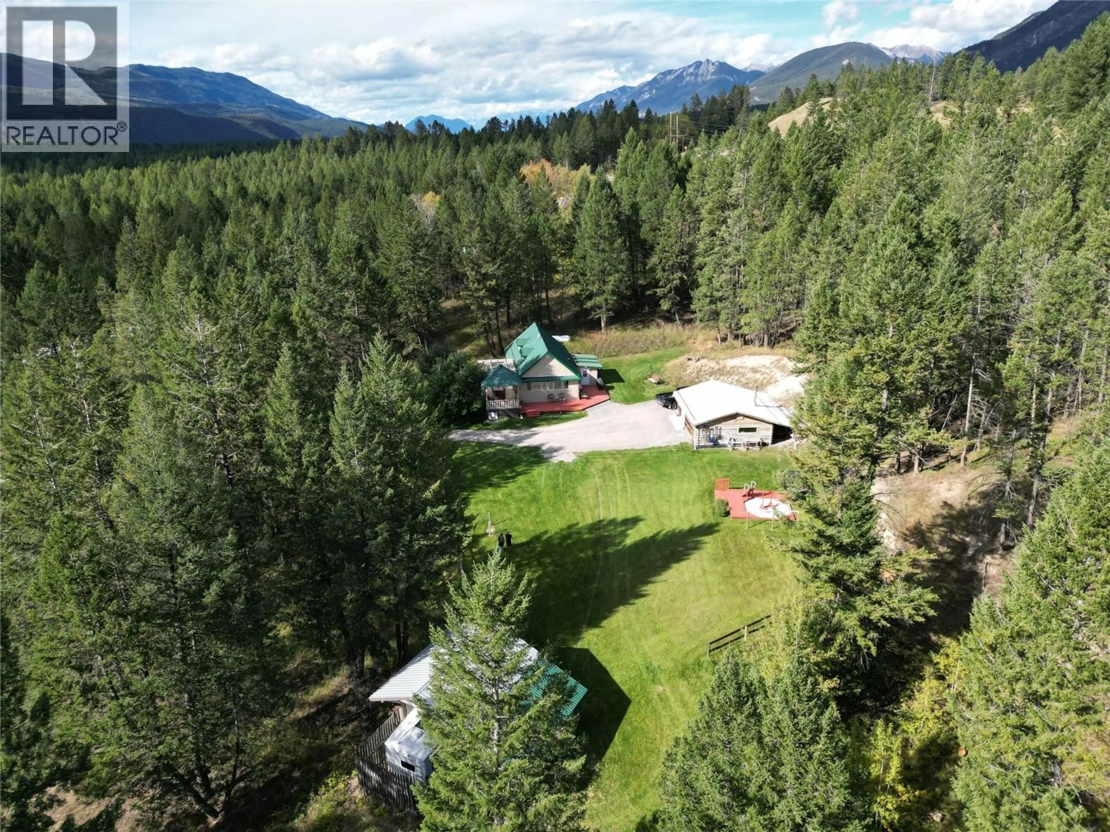 A pic from outside/outdoor area/front of a property/back of a property/a pic from drone, mountain view for 5670 GLENMORE DRIVE, Edgewater British Columbia V0A1E0