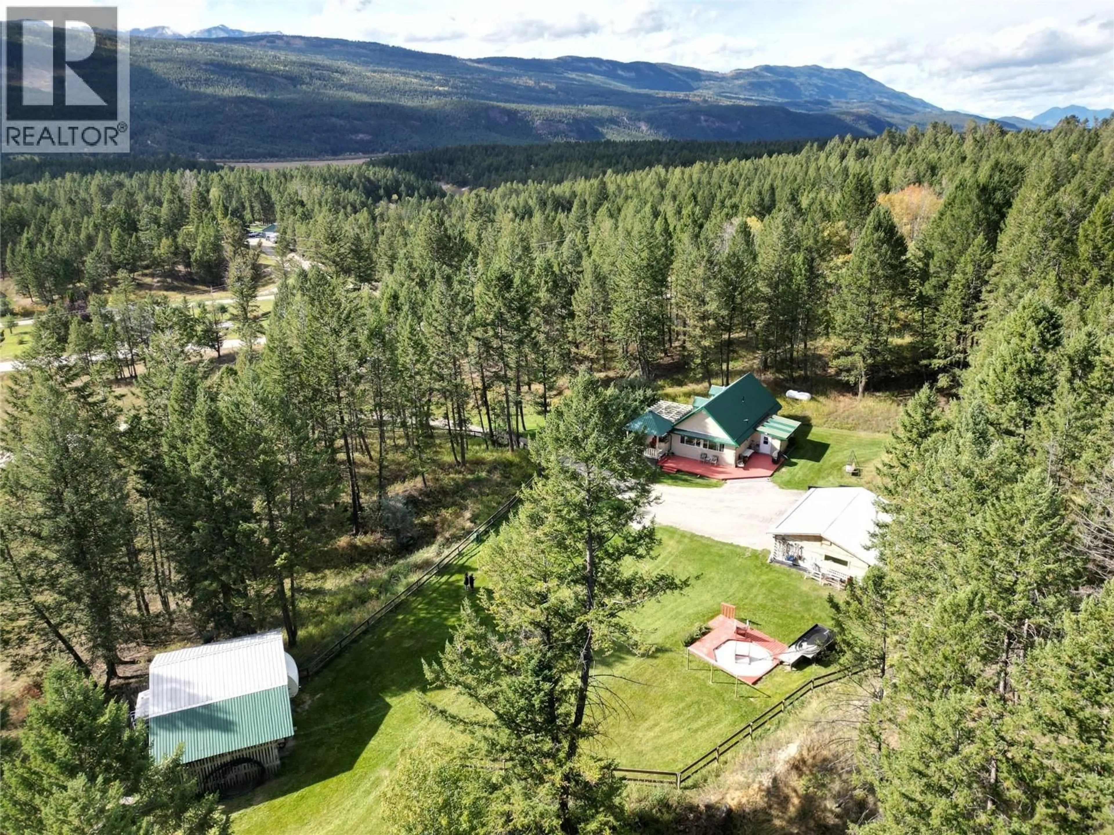 A pic from outside/outdoor area/front of a property/back of a property/a pic from drone, mountain view for 5670 GLENMORE DRIVE, Edgewater British Columbia V0A1E0