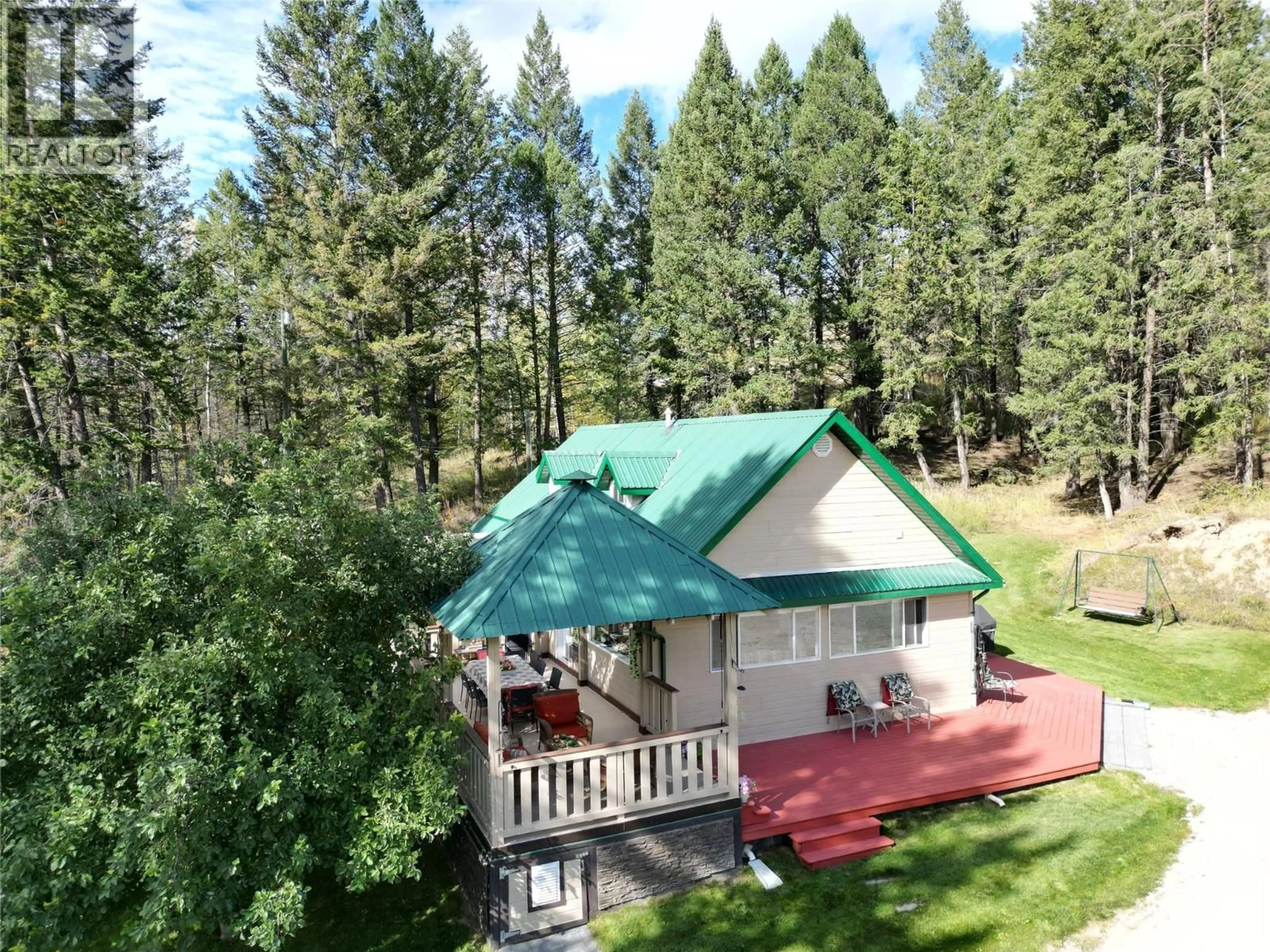 A pic from outside/outdoor area/front of a property/back of a property/a pic from drone, forest/trees view for 5670 GLENMORE DRIVE, Edgewater British Columbia V0A1E0