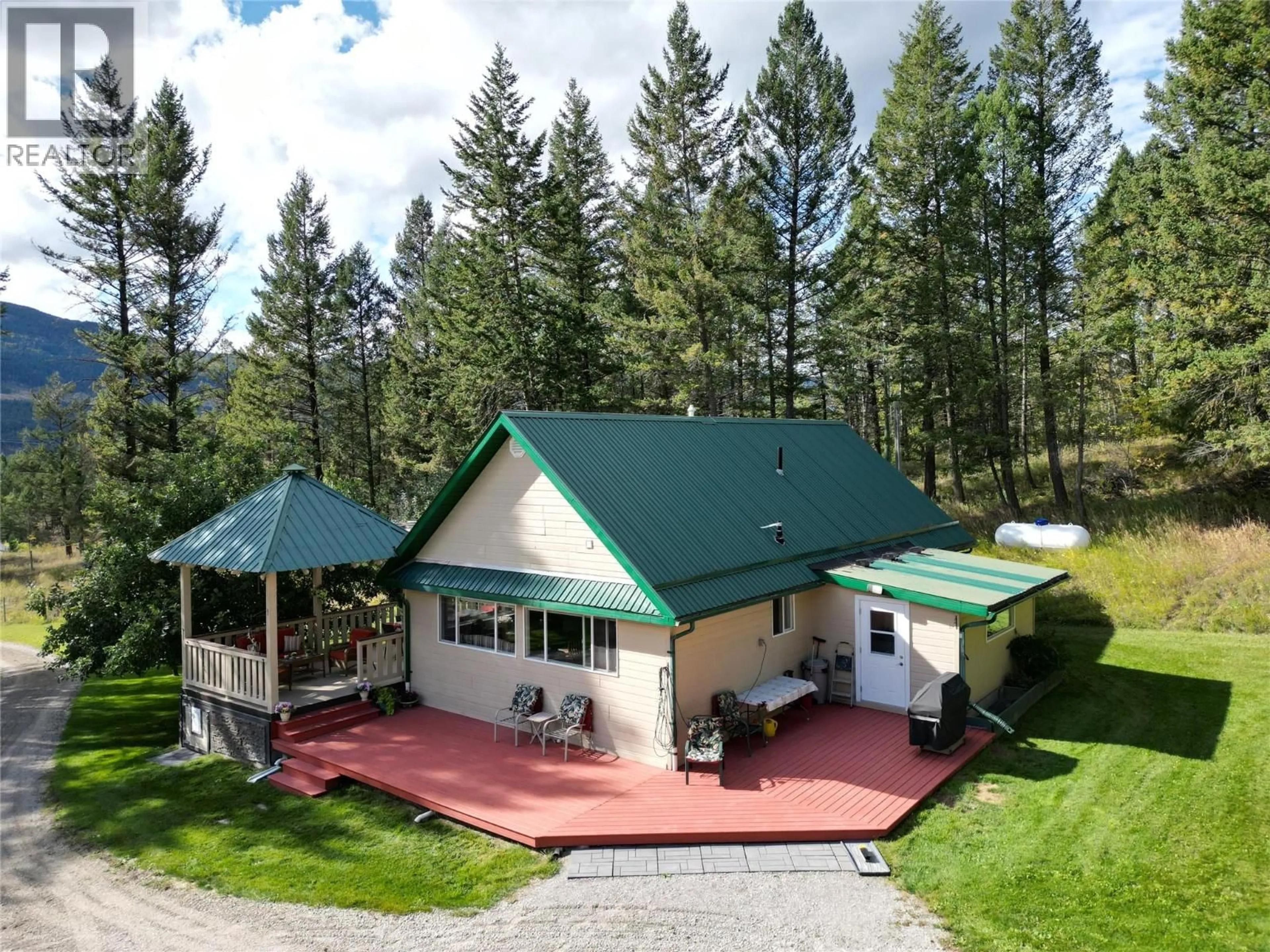 A pic from outside/outdoor area/front of a property/back of a property/a pic from drone, mountain view for 5670 GLENMORE DRIVE, Edgewater British Columbia V0A1E0