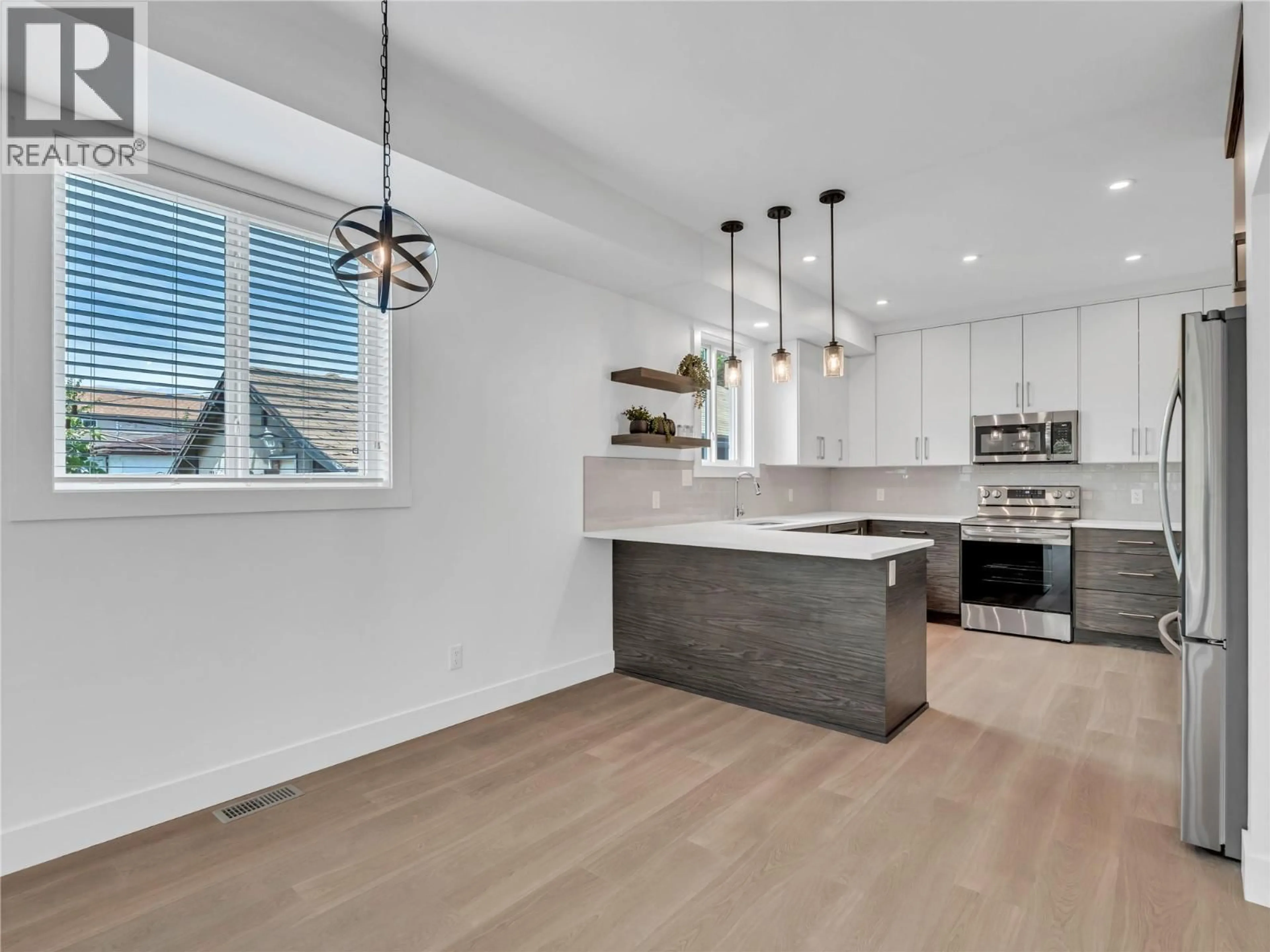 Open concept kitchen, unknown for 102 - 453 MAURICE STREET, Penticton British Columbia V2A5V8