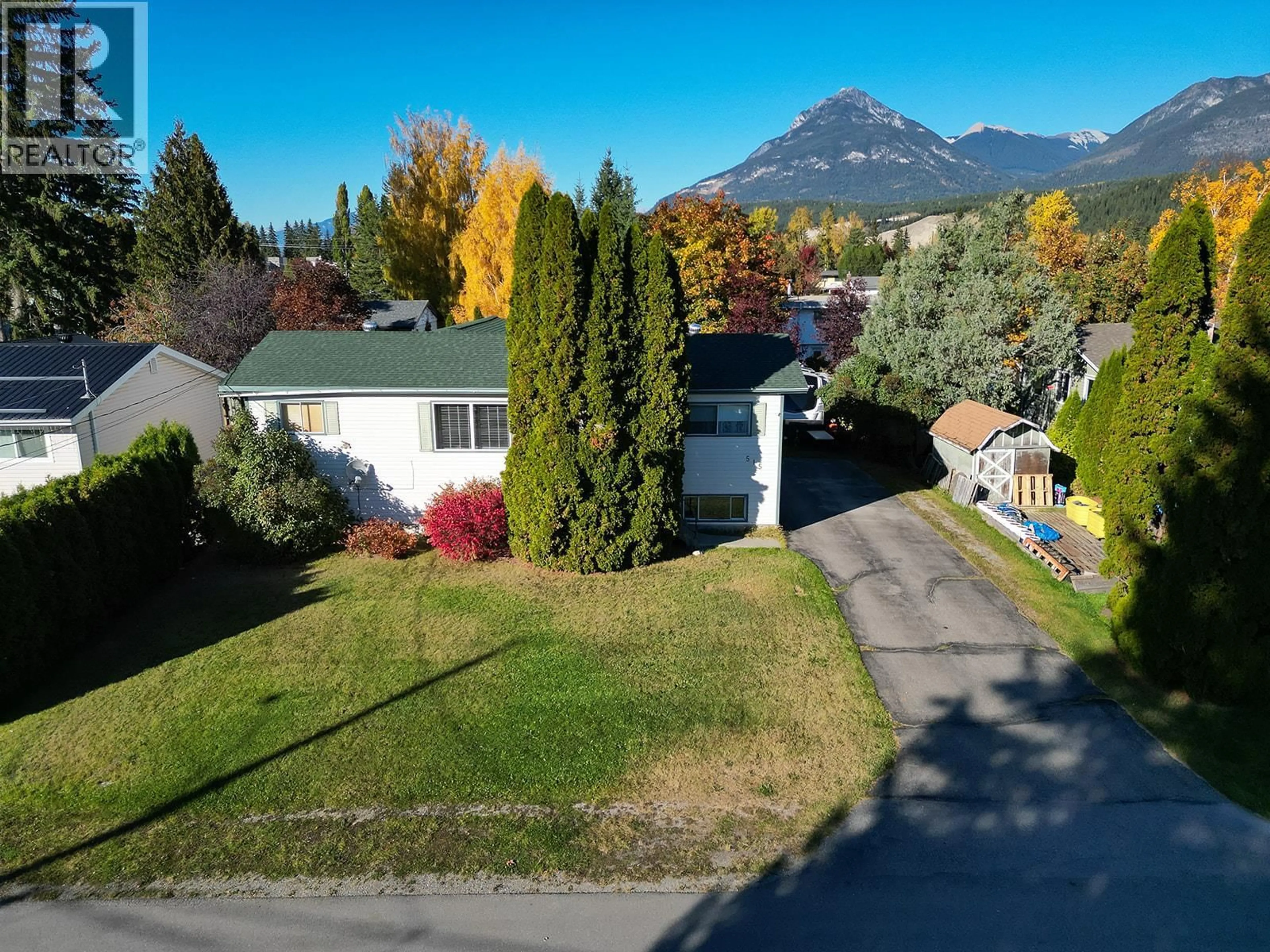 A pic from outside/outdoor area/front of a property/back of a property/a pic from drone, mountain view for 515 7TH STREET, Golden British Columbia V0A1H0