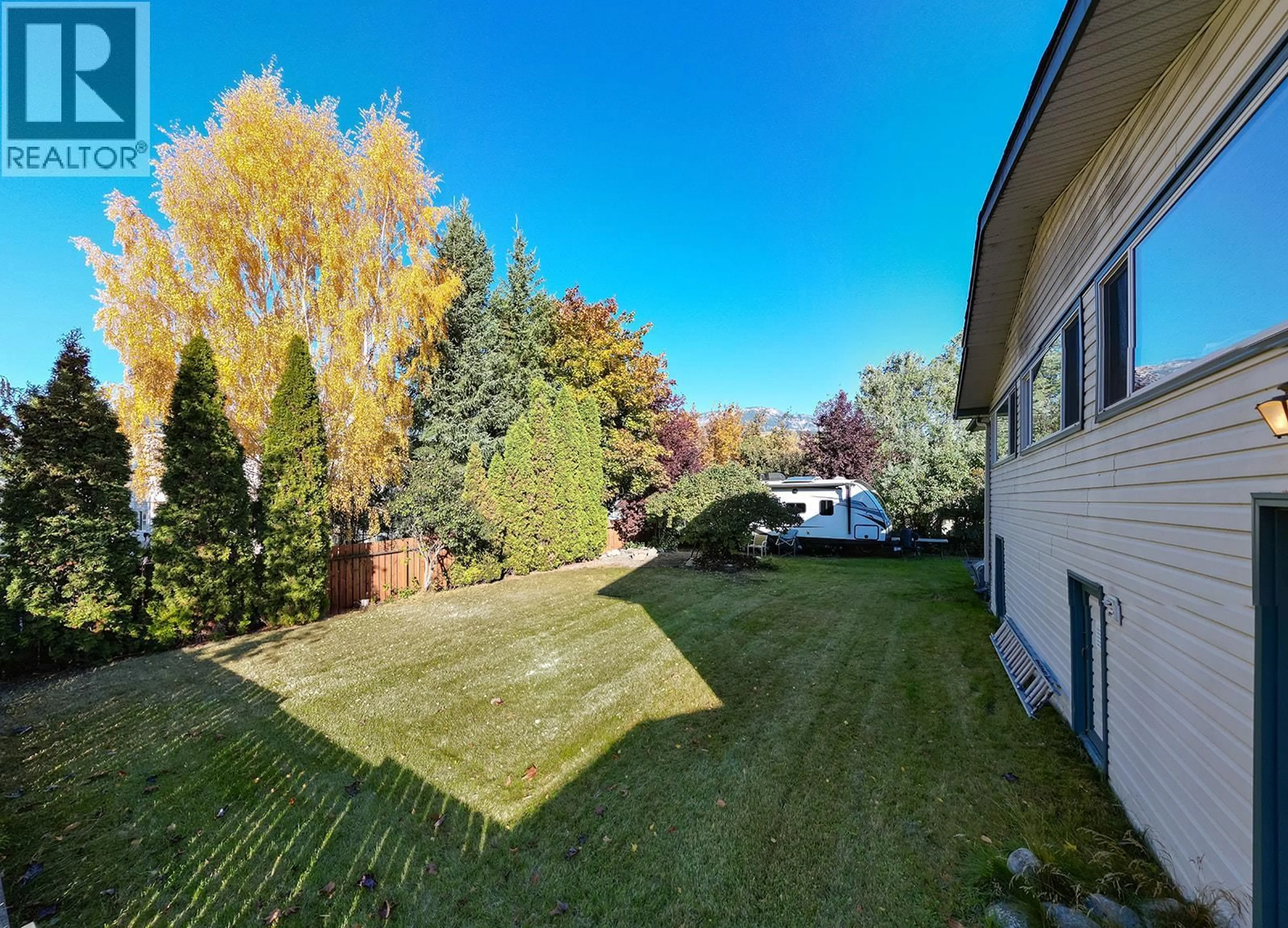 A pic from outside/outdoor area/front of a property/back of a property/a pic from drone, unknown for 515 7TH STREET, Golden British Columbia V0A1H0