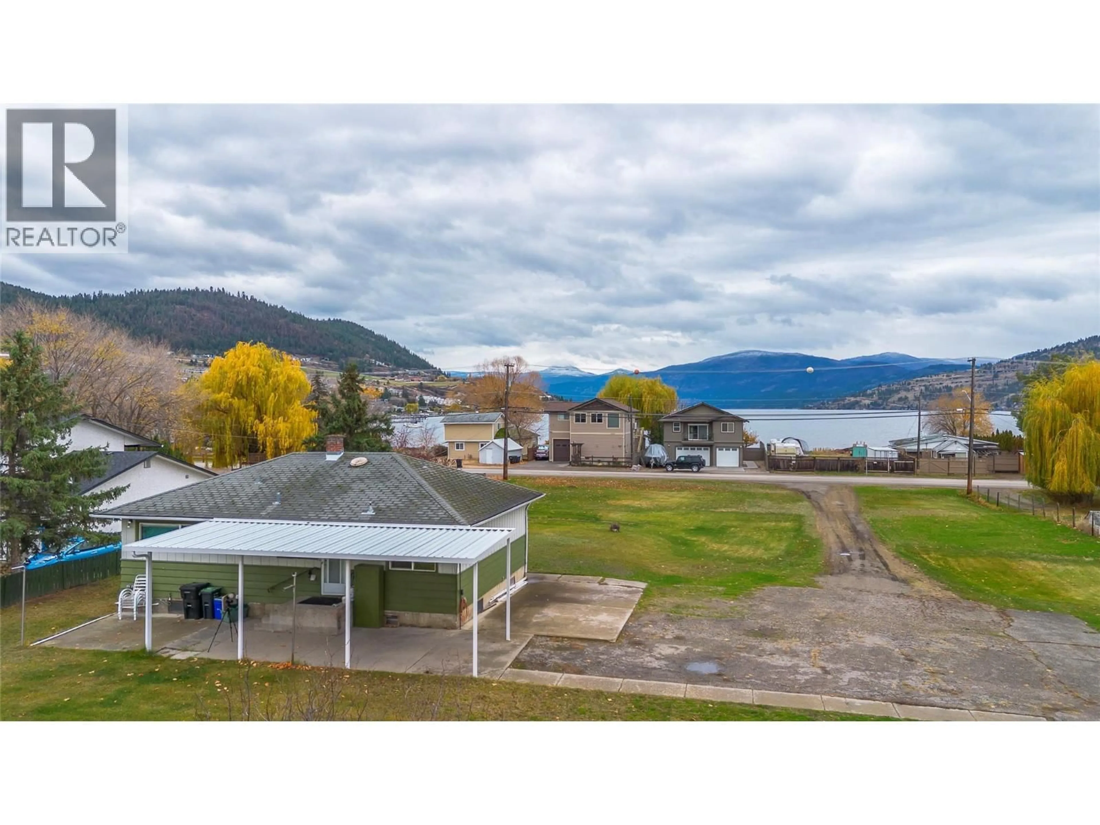 A pic from outside/outdoor area/front of a property/back of a property/a pic from drone, water/lake/river/ocean view for 2619 LAKESHORE ROAD, Vernon British Columbia V1H1N1