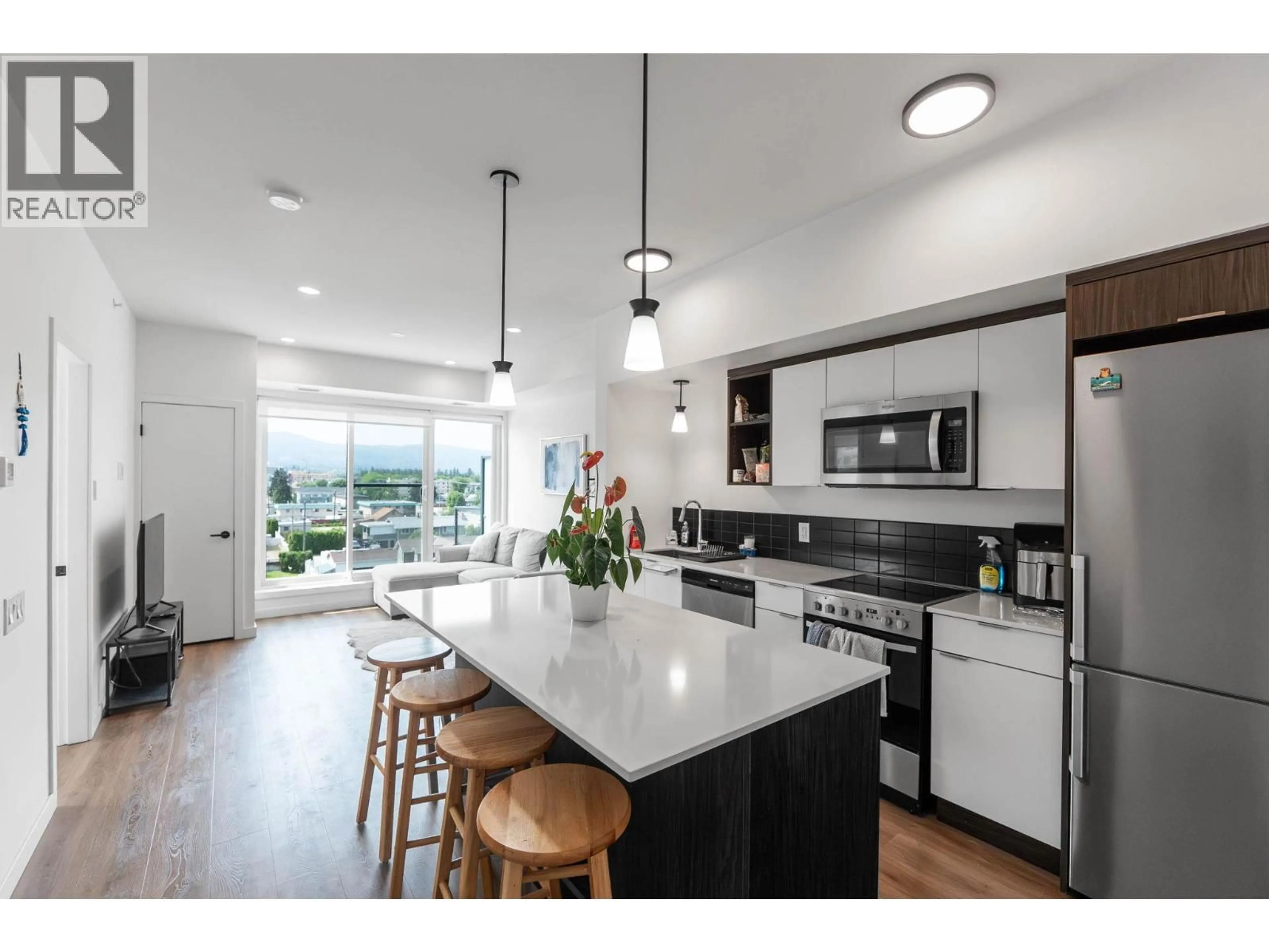 Open concept kitchen, ceramic/tile floor for 510 - 615 RUTLAND ROAD, Kelowna British Columbia V1V0B3