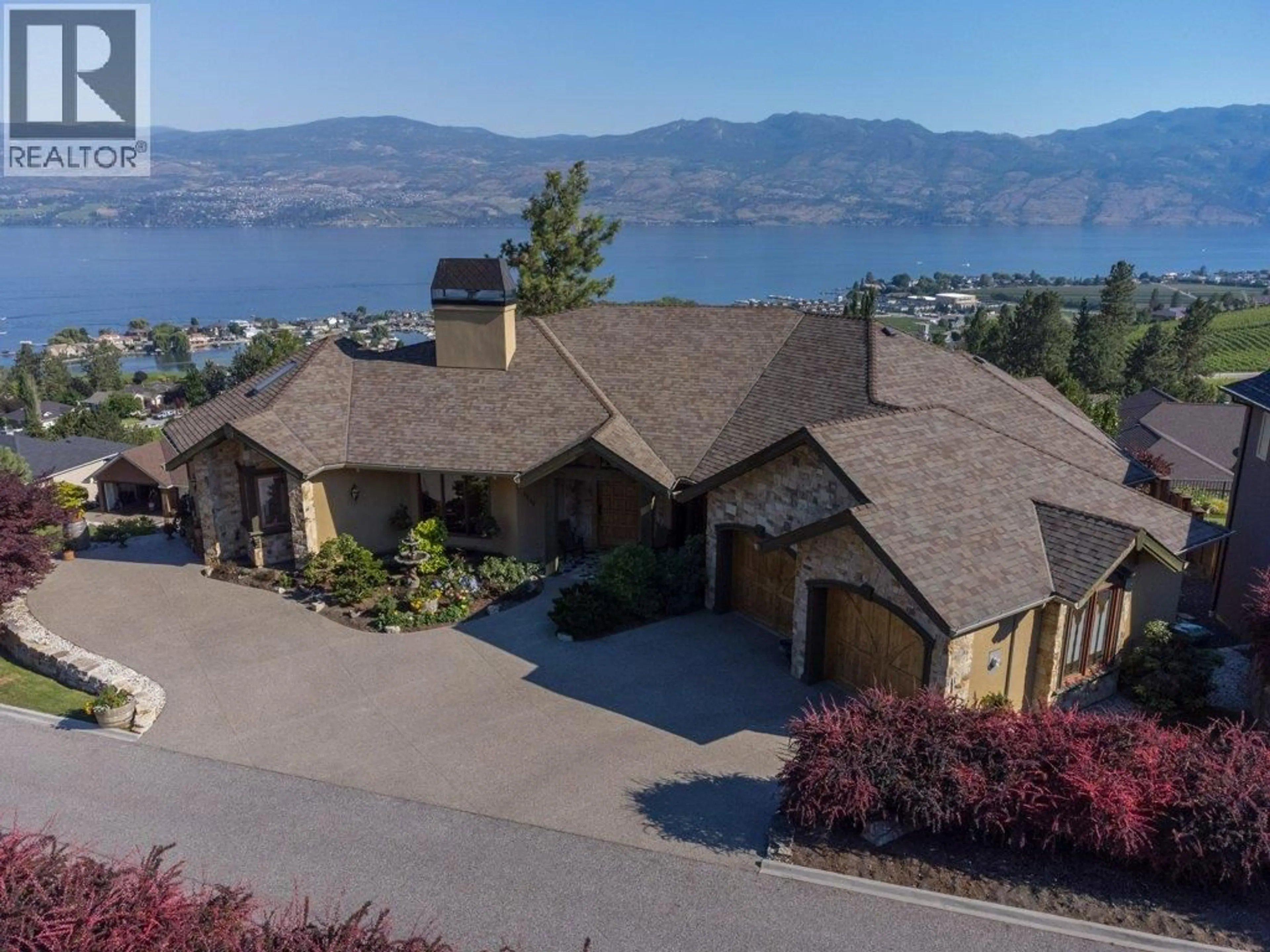 A pic from outside/outdoor area/front of a property/back of a property/a pic from drone, water/lake/river/ocean view for 1555 GREGORY ROAD, West Kelowna British Columbia V4T2V7