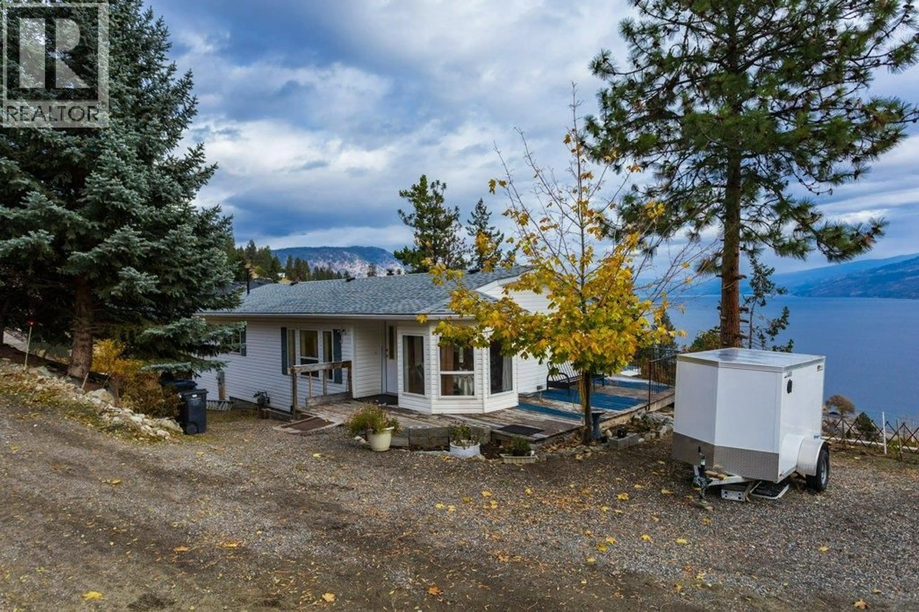 A pic from outside/outdoor area/front of a property/back of a property/a pic from drone, water/lake/river/ocean view for 6 - 5906 SOMERSET AVENUE, Peachland British Columbia V0H1X4