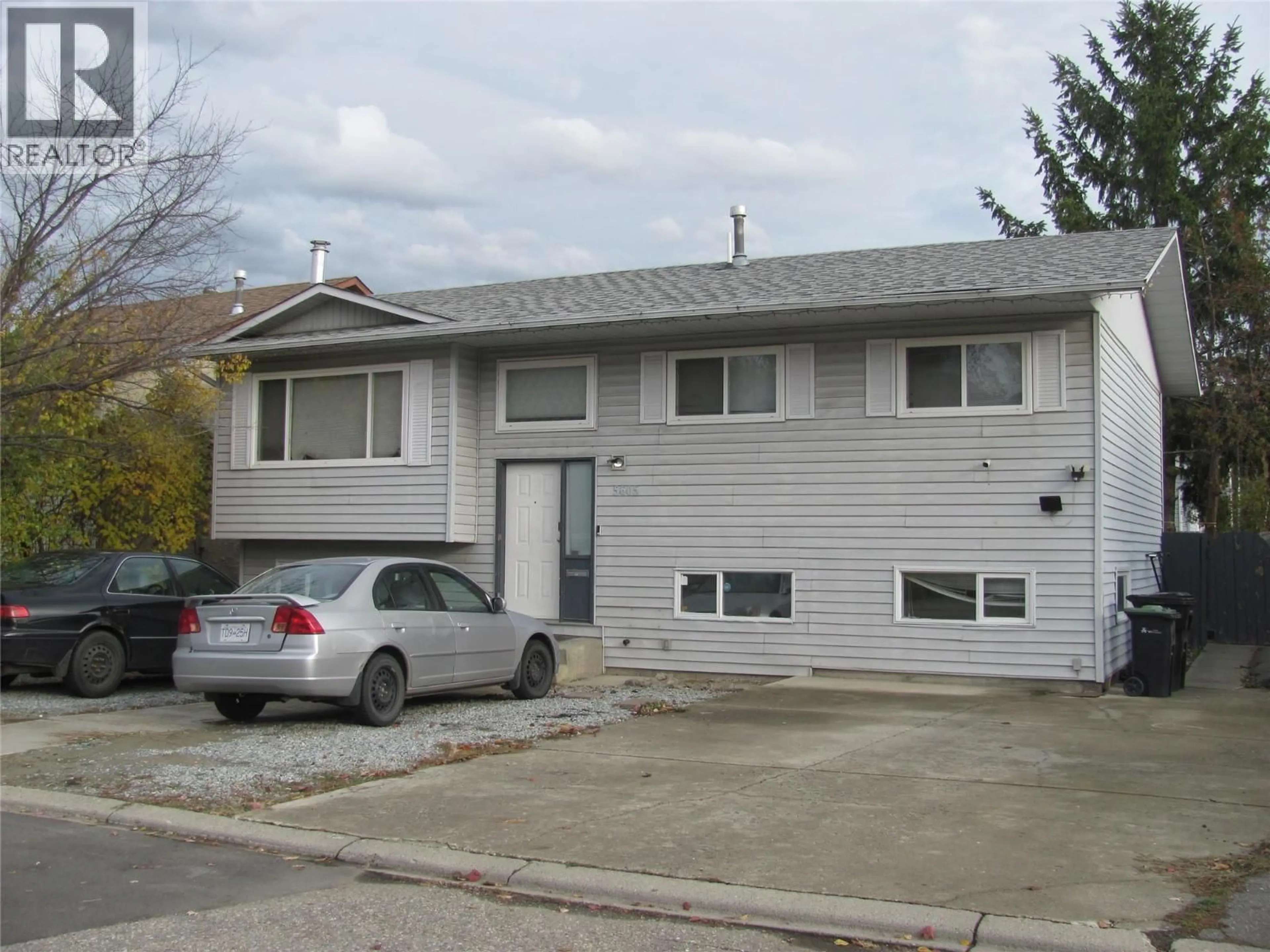 Home with vinyl exterior material, street for 5605 WILLOW DRIVE, Vernon British Columbia V1T7W3