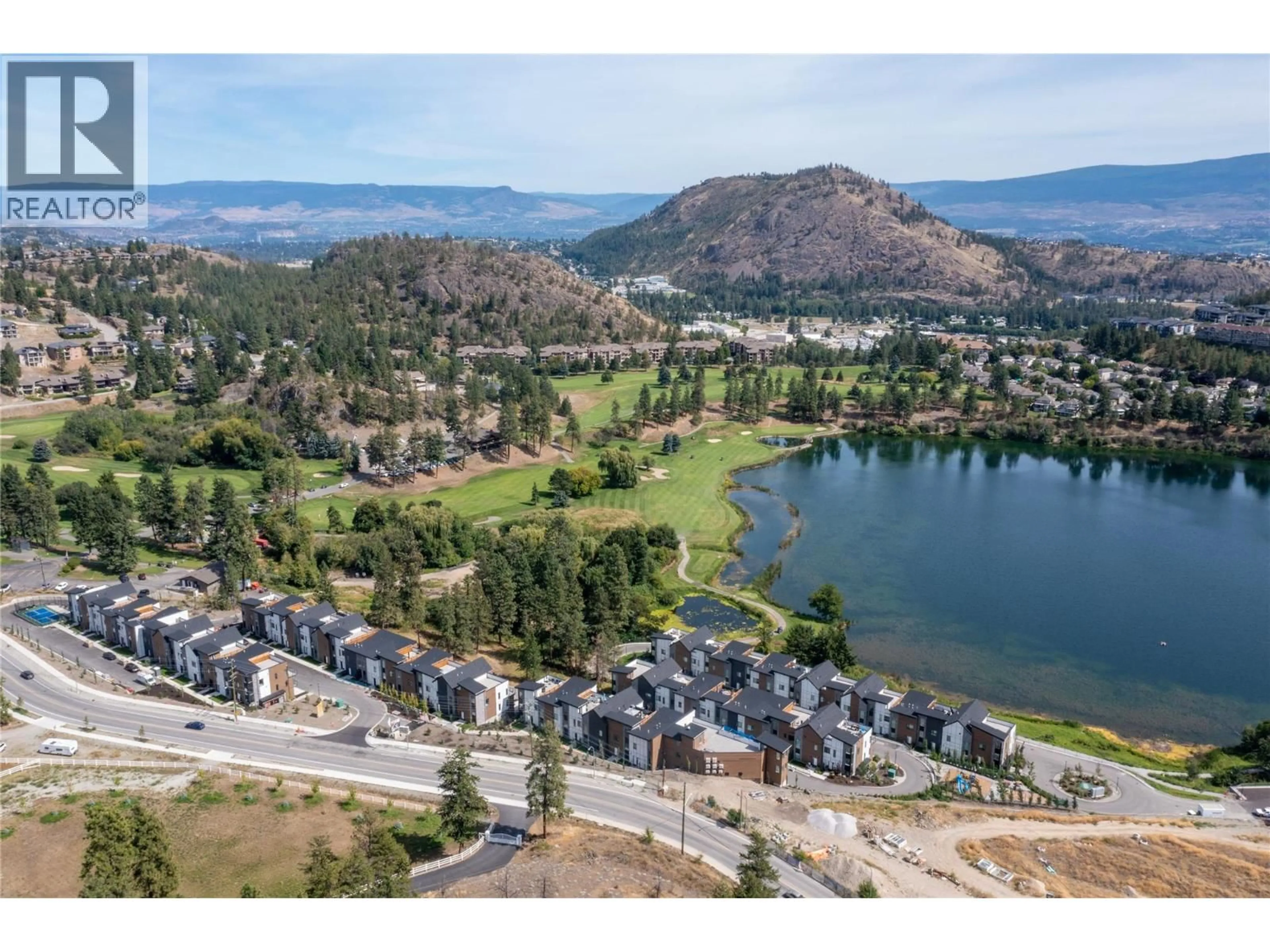 A pic from outside/outdoor area/front of a property/back of a property/a pic from drone, water/lake/river/ocean view for 404 - 2735 SHANNON LAKE ROAD, West Kelowna British Columbia V4T1V6