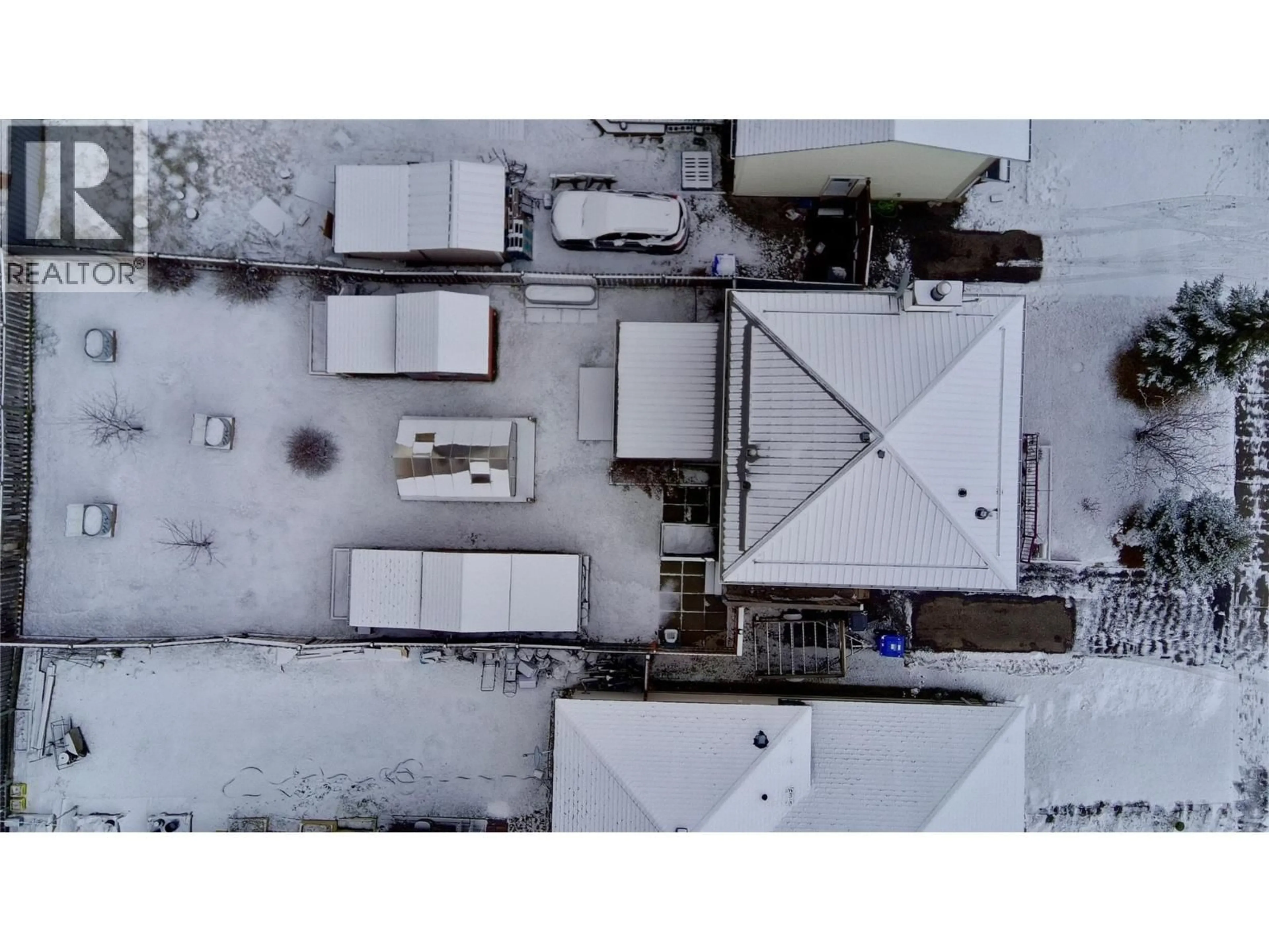 A pic from outside/outdoor area/front of a property/back of a property/a pic from drone, building for 128 SPIEKER AVENUE, Tumbler Ridge British Columbia V0C2W0