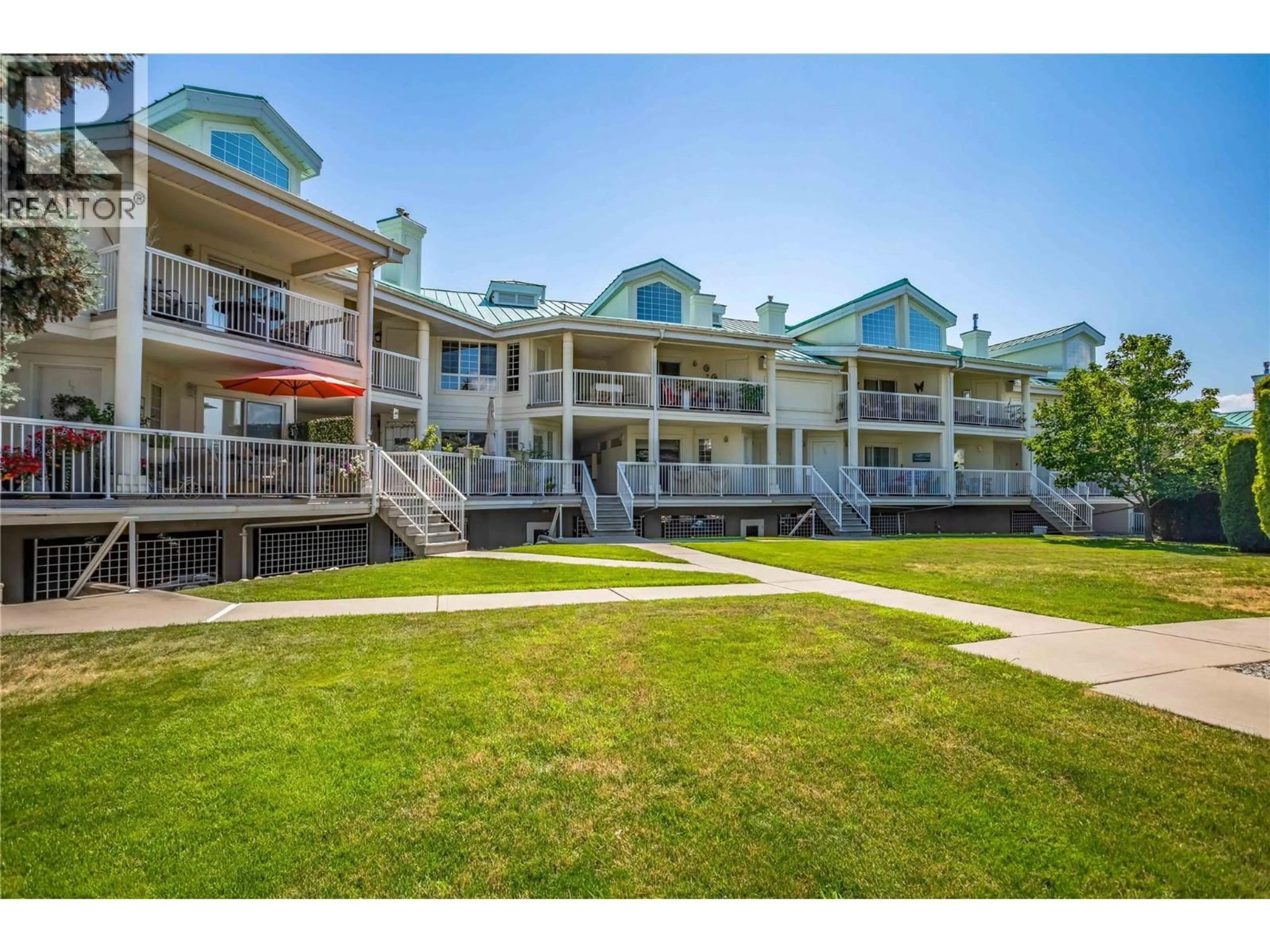 A pic from outside/outdoor area/front of a property/back of a property/a pic from drone, water/lake/river/ocean view for 125 - 2370 STILLINGFLEET ROAD, Kelowna British Columbia V1W3X8