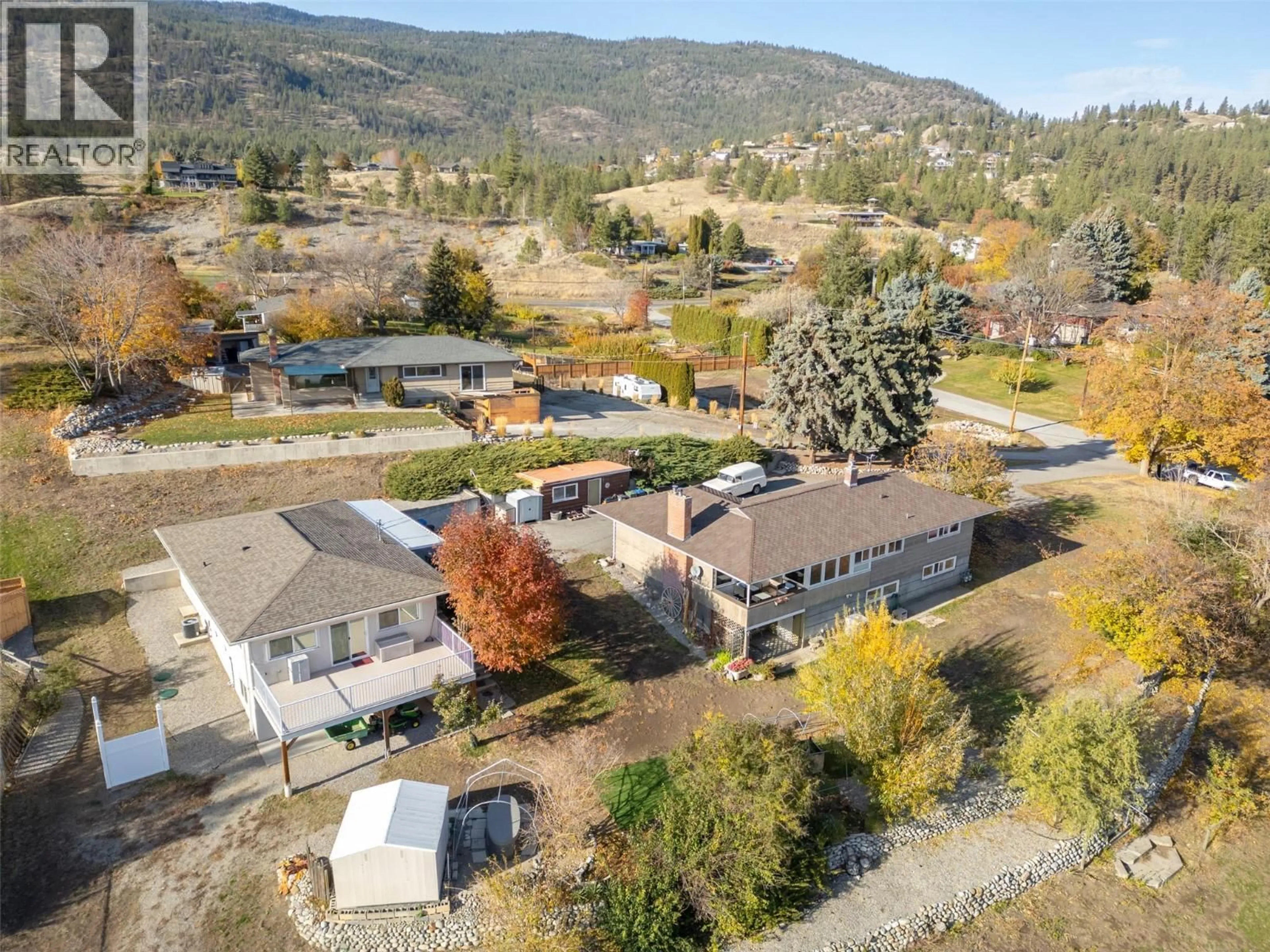A pic from outside/outdoor area/front of a property/back of a property/a pic from drone, mountain view for 901 NEWTON DRIVE, Penticton British Columbia V2A8Z4