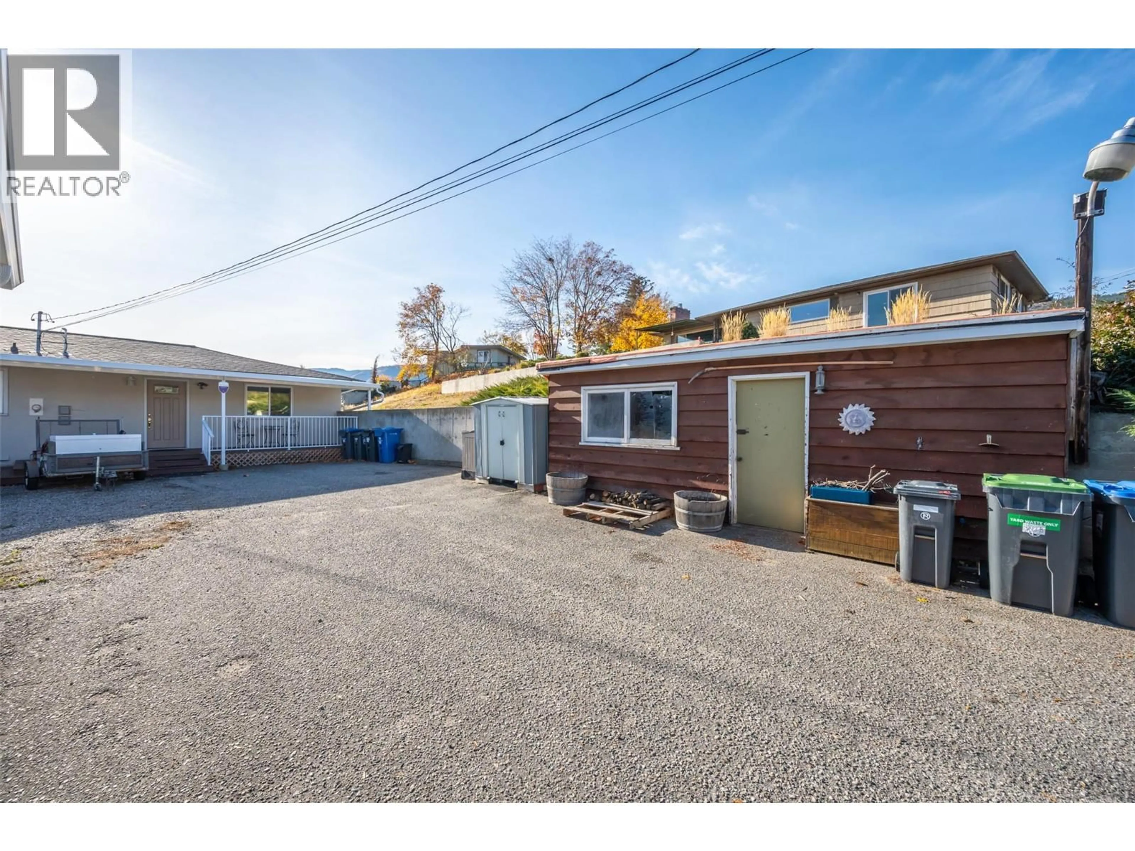 A pic from outside/outdoor area/front of a property/back of a property/a pic from drone, street for 901 NEWTON DRIVE, Penticton British Columbia V2A8Z4