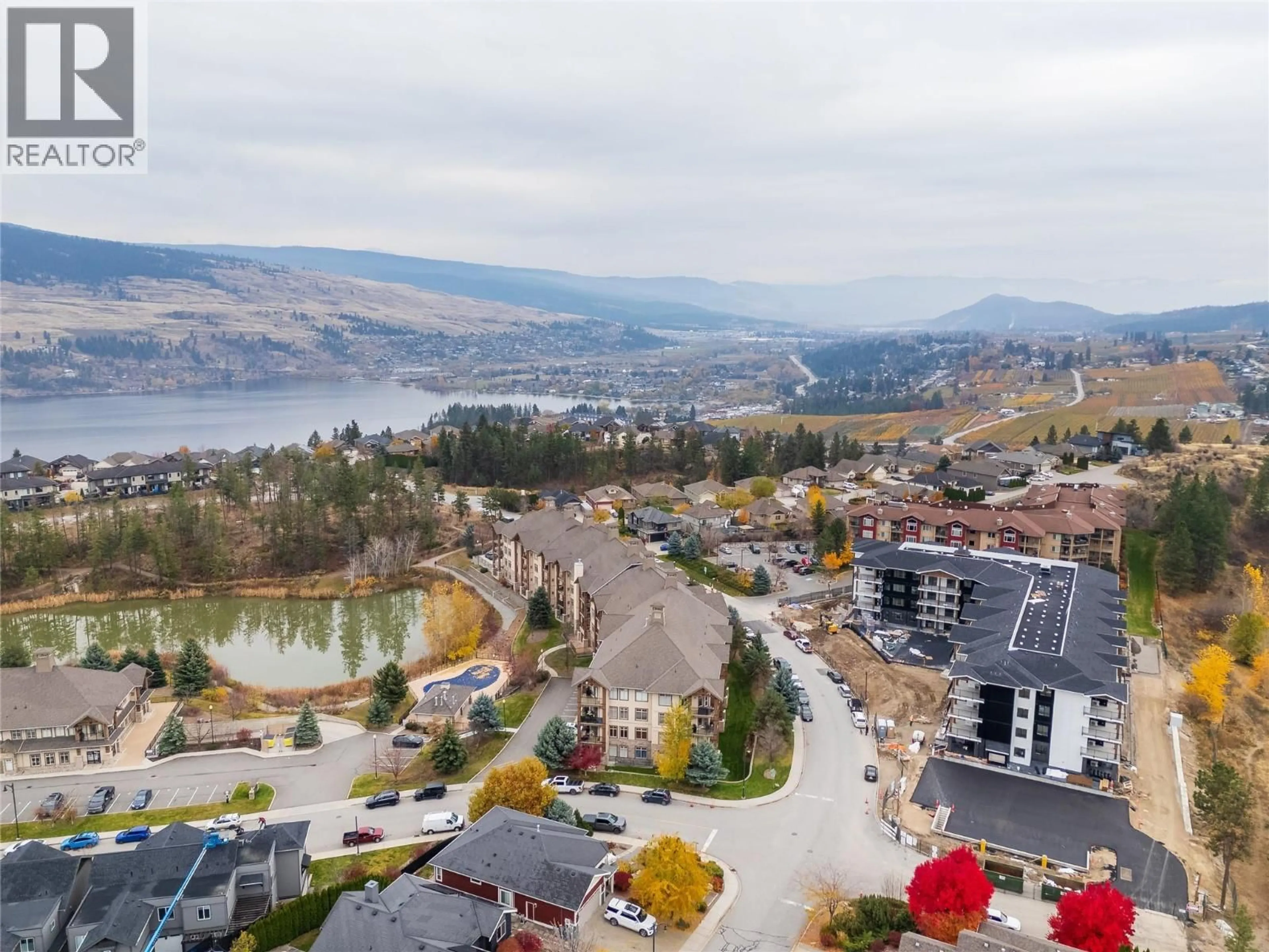 A pic from outside/outdoor area/front of a property/back of a property/a pic from drone, water/lake/river/ocean view for 203 - 2551 SHORELINE DRIVE, Lake Country British Columbia V4V2P2