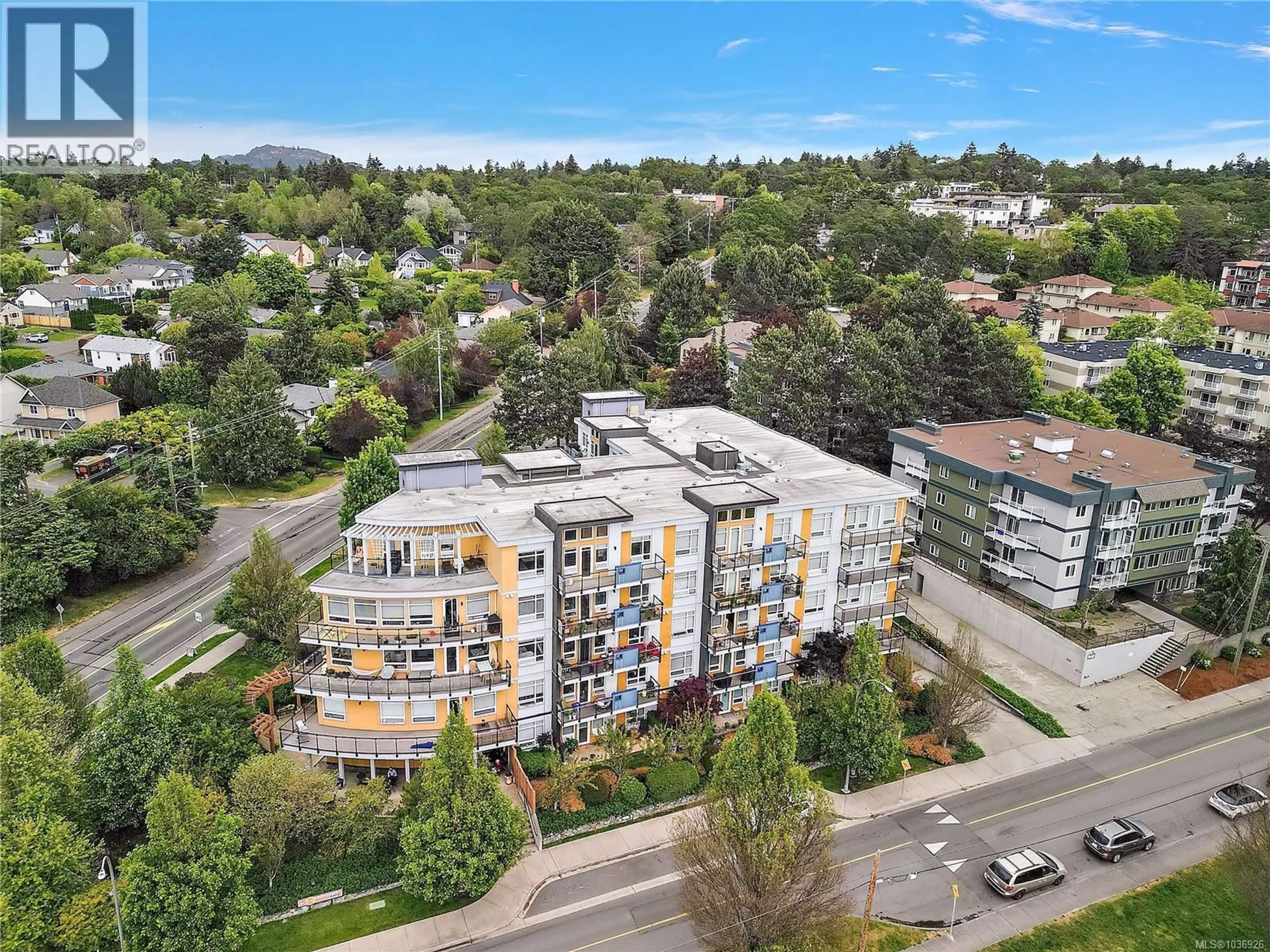 A pic from outside/outdoor area/front of a property/back of a property/a pic from drone, city buildings view from balcony for 307 - 935 CLOVERDALE AVENUE, Saanich British Columbia V8X2T4