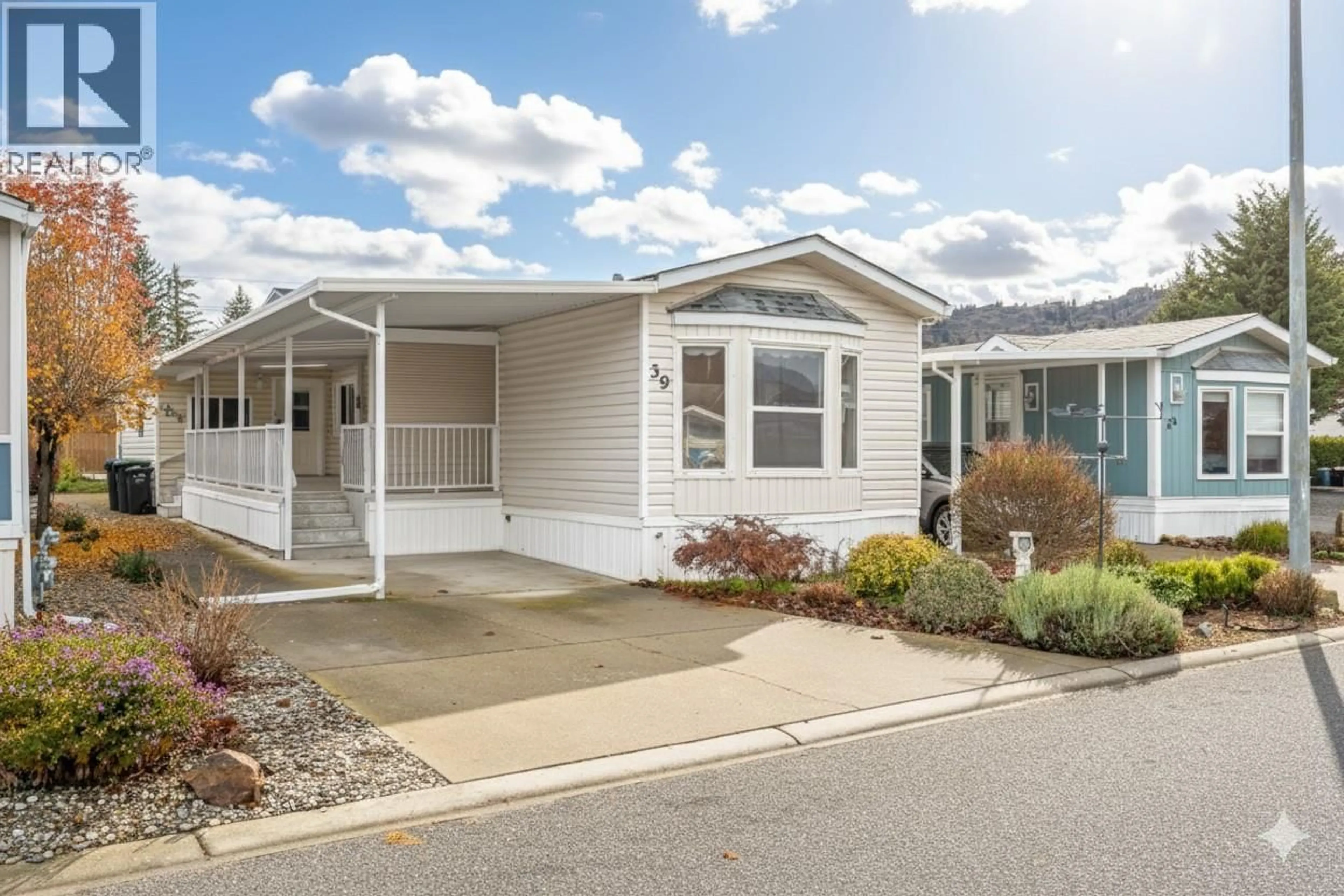 Home with vinyl exterior material, street for 39 - 6778 TUCELNUIT DRIVE, Oliver British Columbia V0H1T0