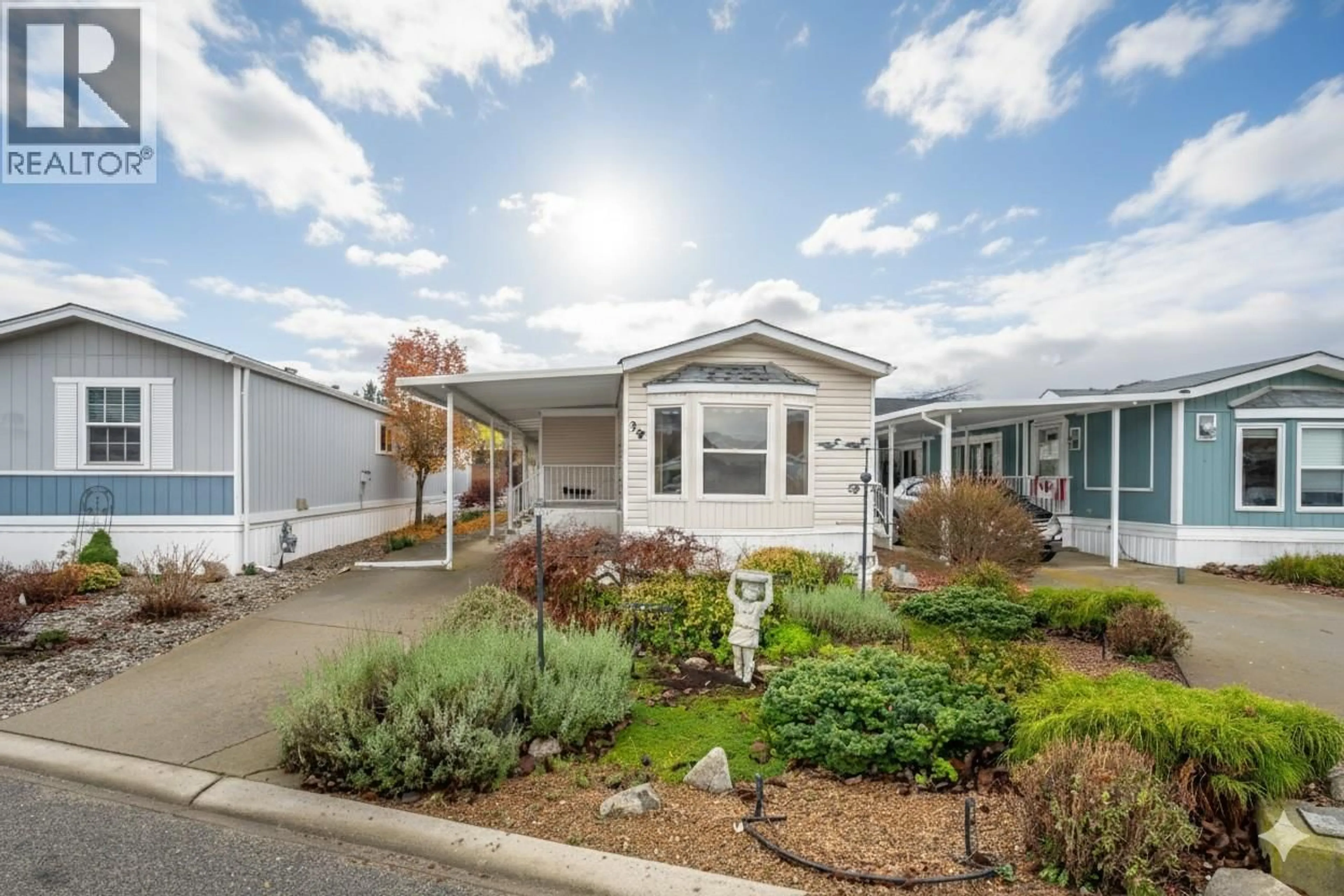 Home with vinyl exterior material, street for 39 - 6778 TUCELNUIT DRIVE, Oliver British Columbia V0H1T0