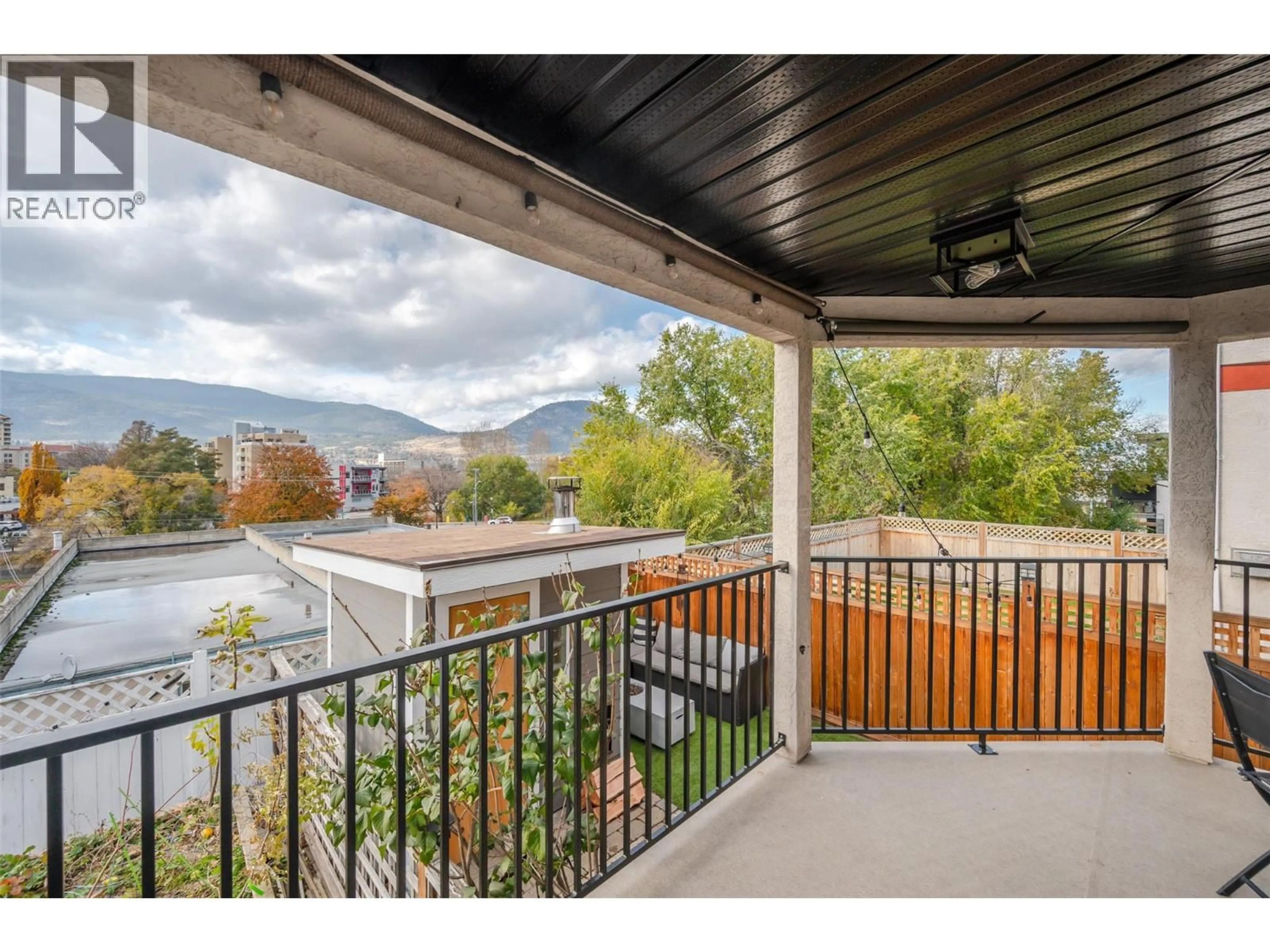Patio, mountain view for 101 - 93 VAN HORNE STREET, Penticton British Columbia V2A4J9