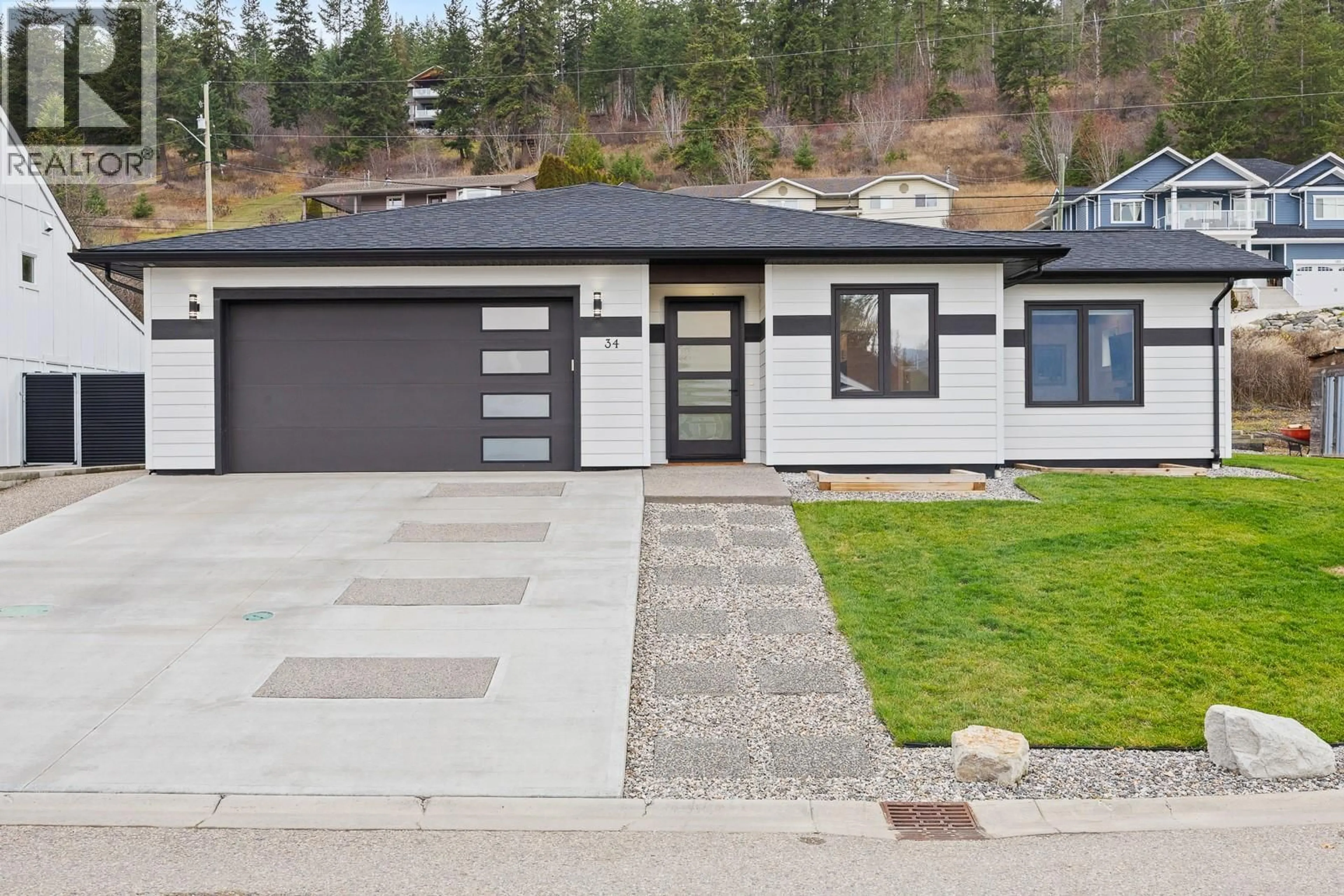Home with vinyl exterior material, street for 34 PRESTON DRIVE WEST, Enderby British Columbia V0E1V3