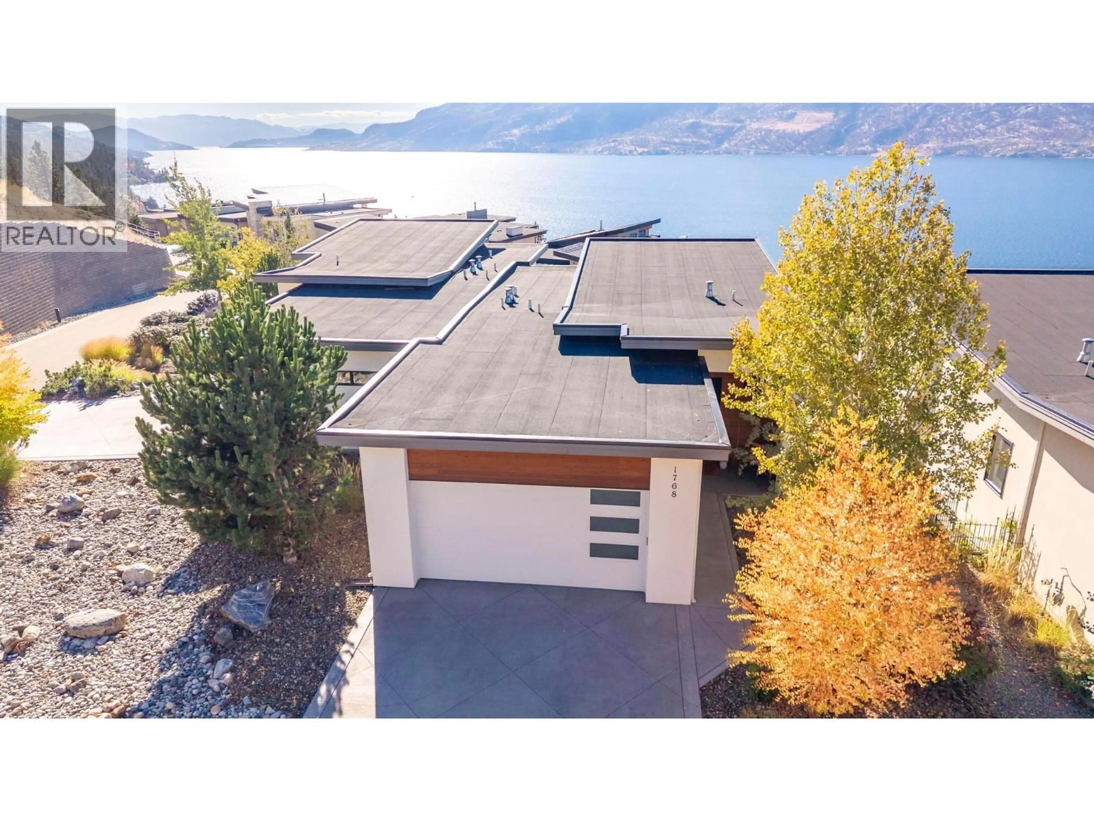 A pic from outside/outdoor area/front of a property/back of a property/a pic from drone, water/lake/river/ocean view for 1768 SLATEVIEW CRESCENT, Lake Country British Columbia V4V2T4