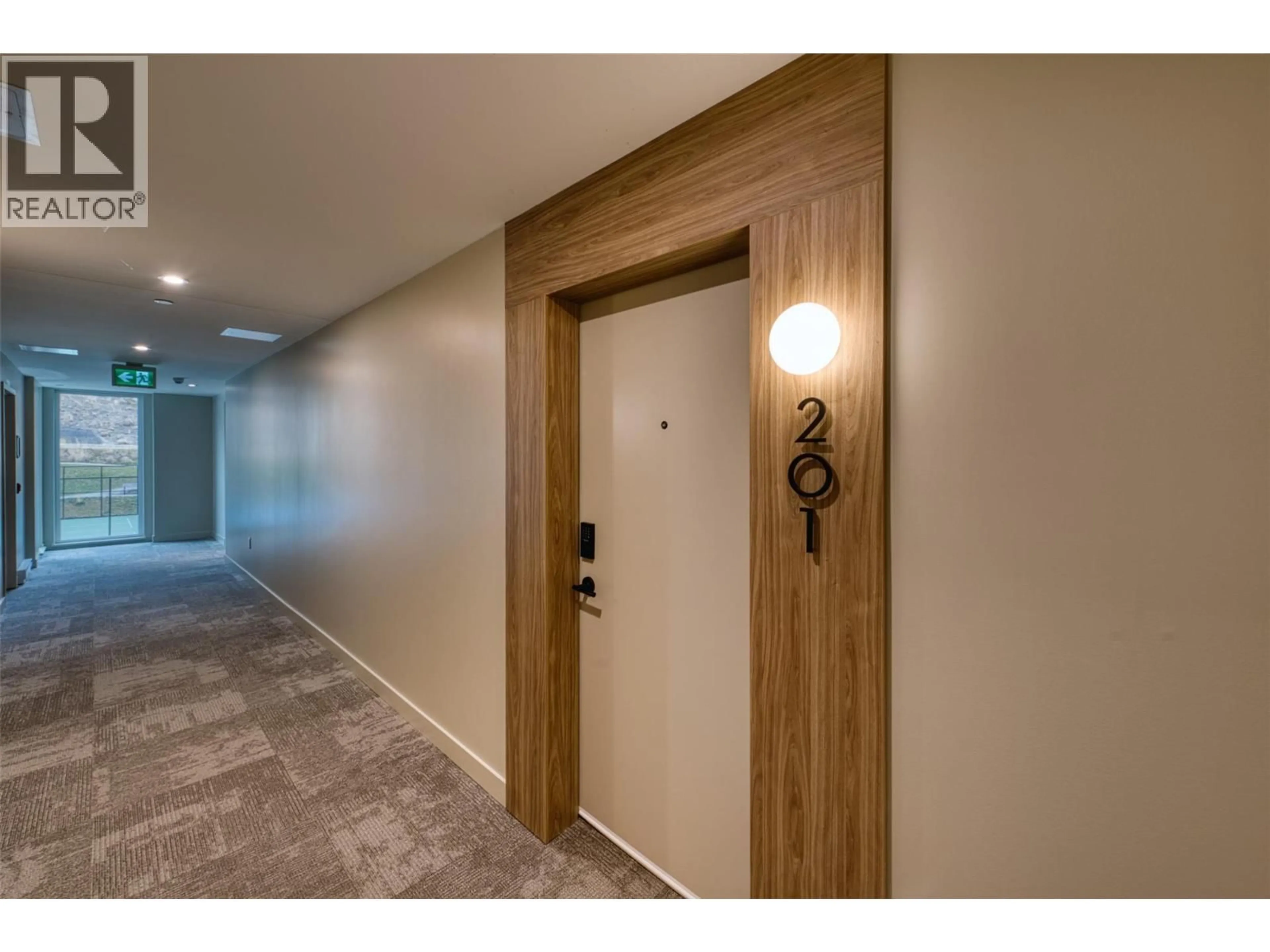 Indoor foyer for 201 - 9654 BENCHLAND DRIVE, Lake Country British Columbia V4V0C5