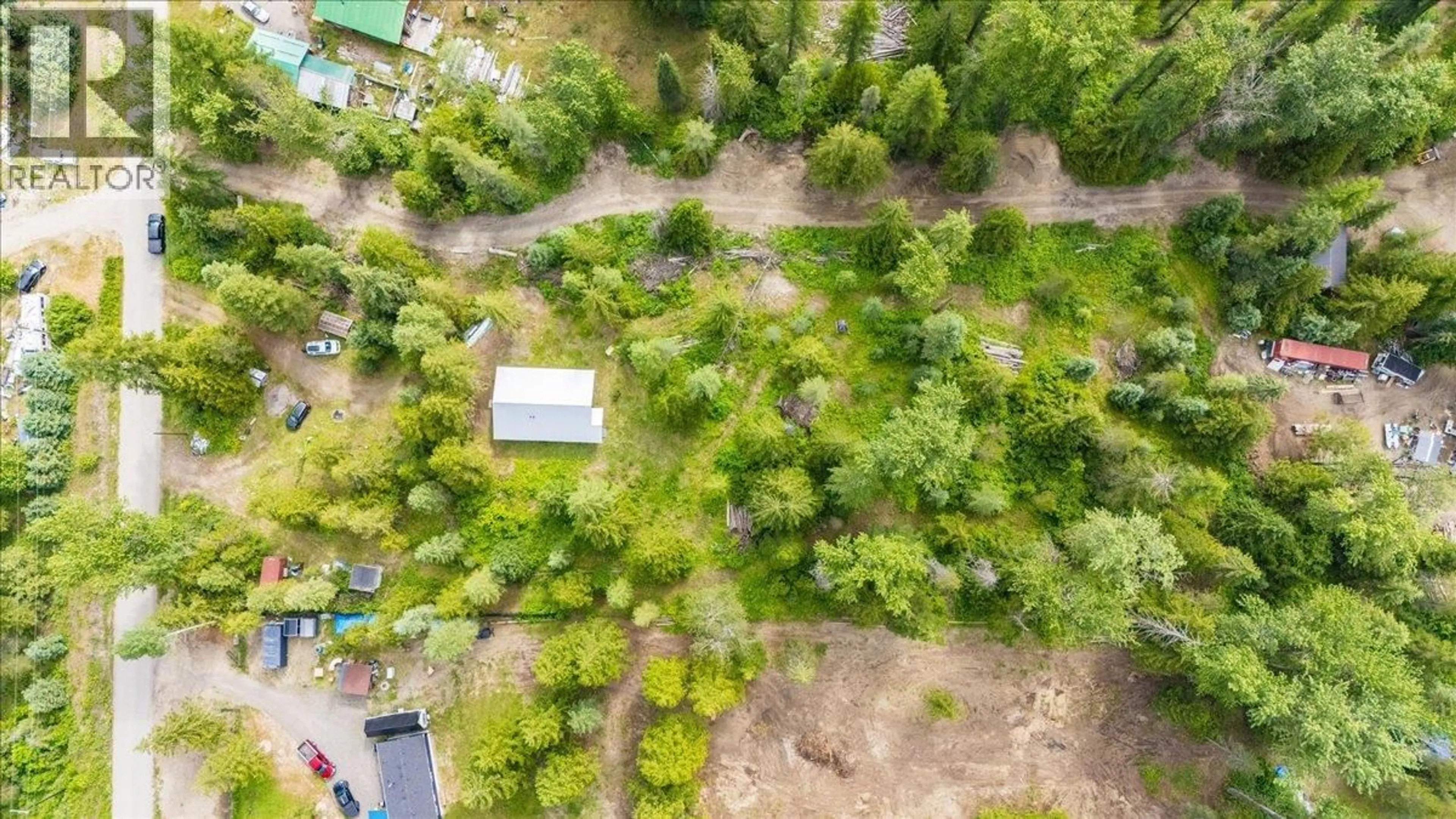 A pic from outside/outdoor area/front of a property/back of a property/a pic from drone, forest/trees view for 116 LINESS ROAD, Salmo British Columbia V0G1Z0