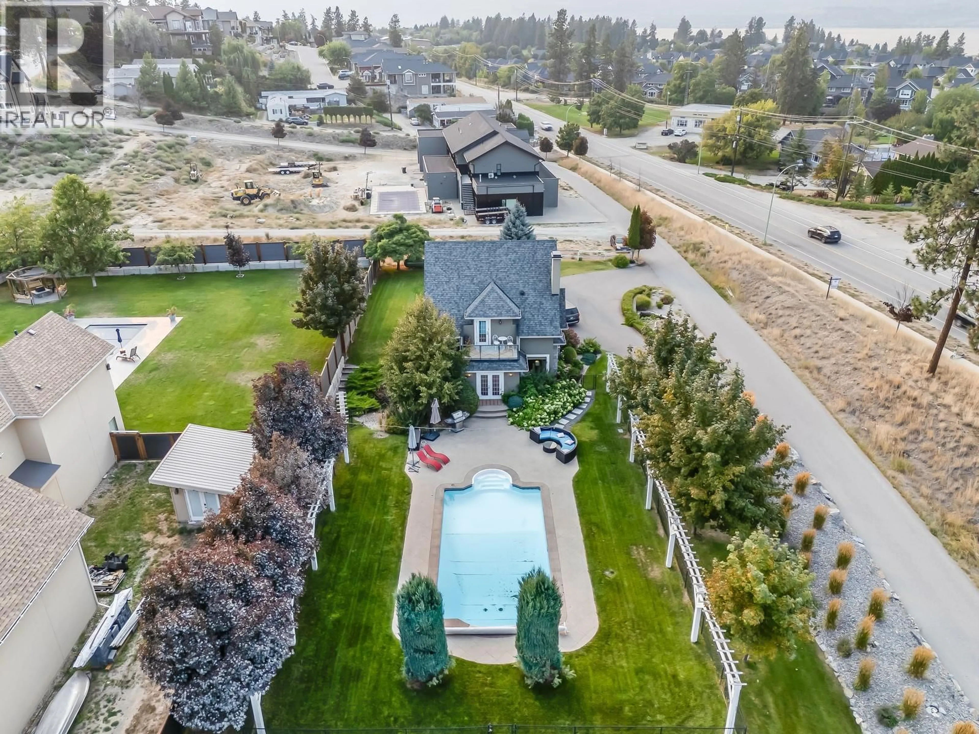 A pic from outside/outdoor area/front of a property/back of a property/a pic from drone, water/lake/river/ocean view for 5308 UPPER MISSION DRIVE, Kelowna British Columbia V1W3S9