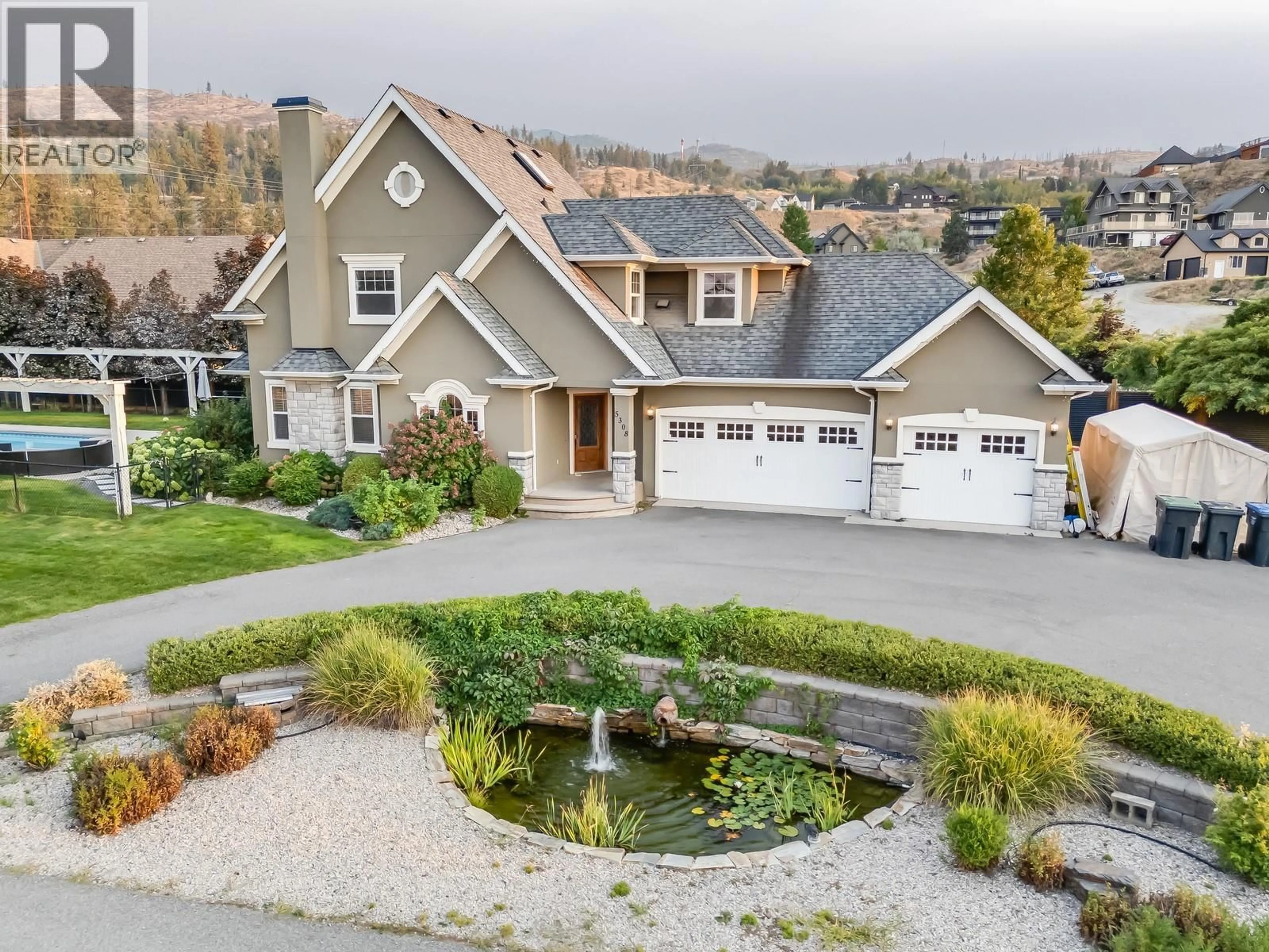 Home with vinyl exterior material, mountain view for 5308 UPPER MISSION DRIVE, Kelowna British Columbia V1W3S9