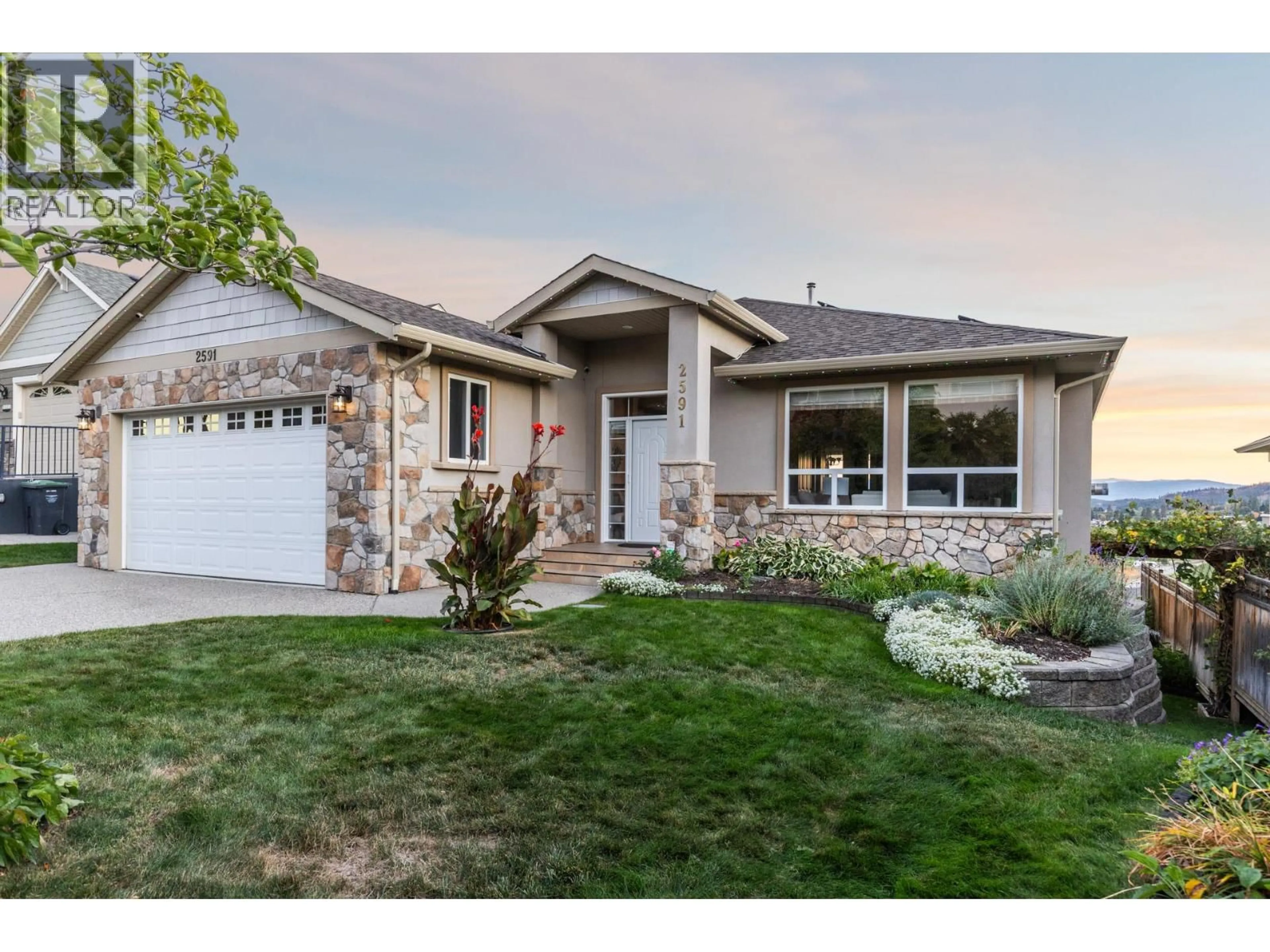 Home with vinyl exterior material, street for 2591 LAKE BREEZE COURT, Lake Country British Columbia V4V2M8